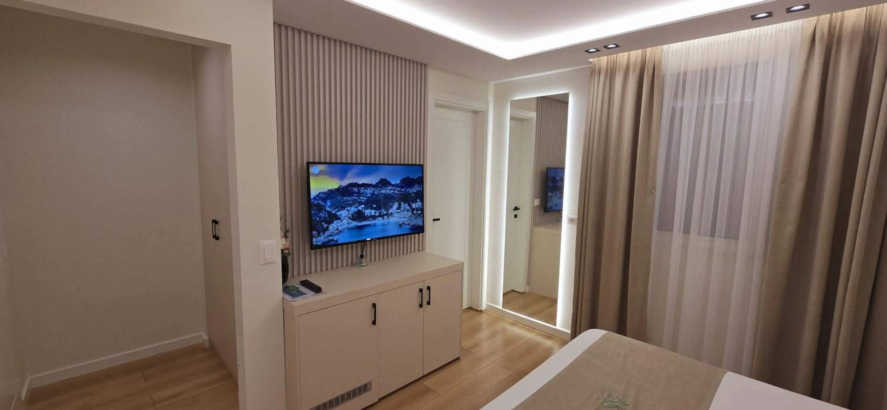 TV and multimedia, Bed in Arkle Apartments 2