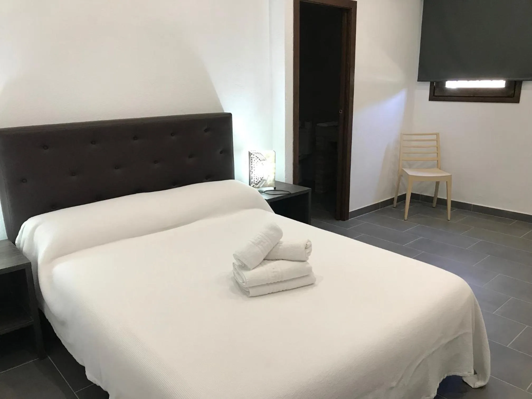 Bed in Hotel Mas Palou