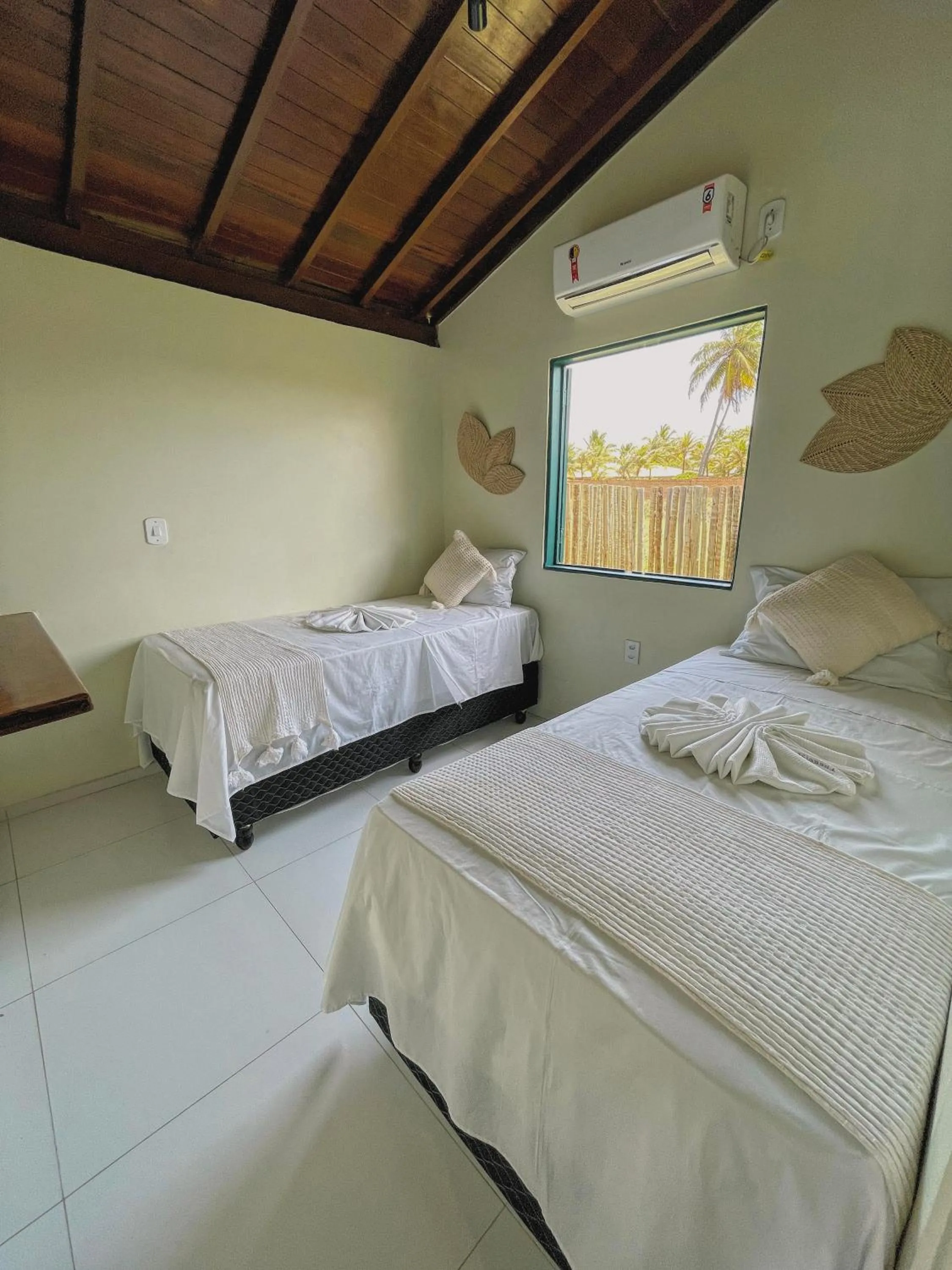 Bed in Pousada Paradise