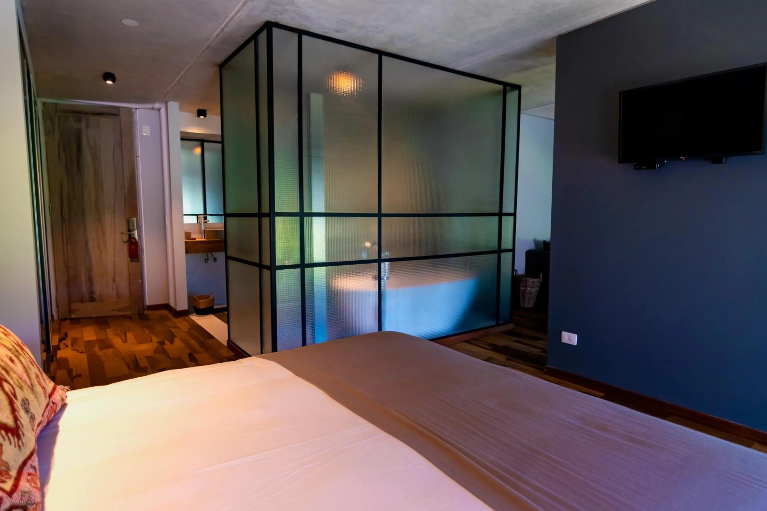 Bed in Be House Suites & Spa