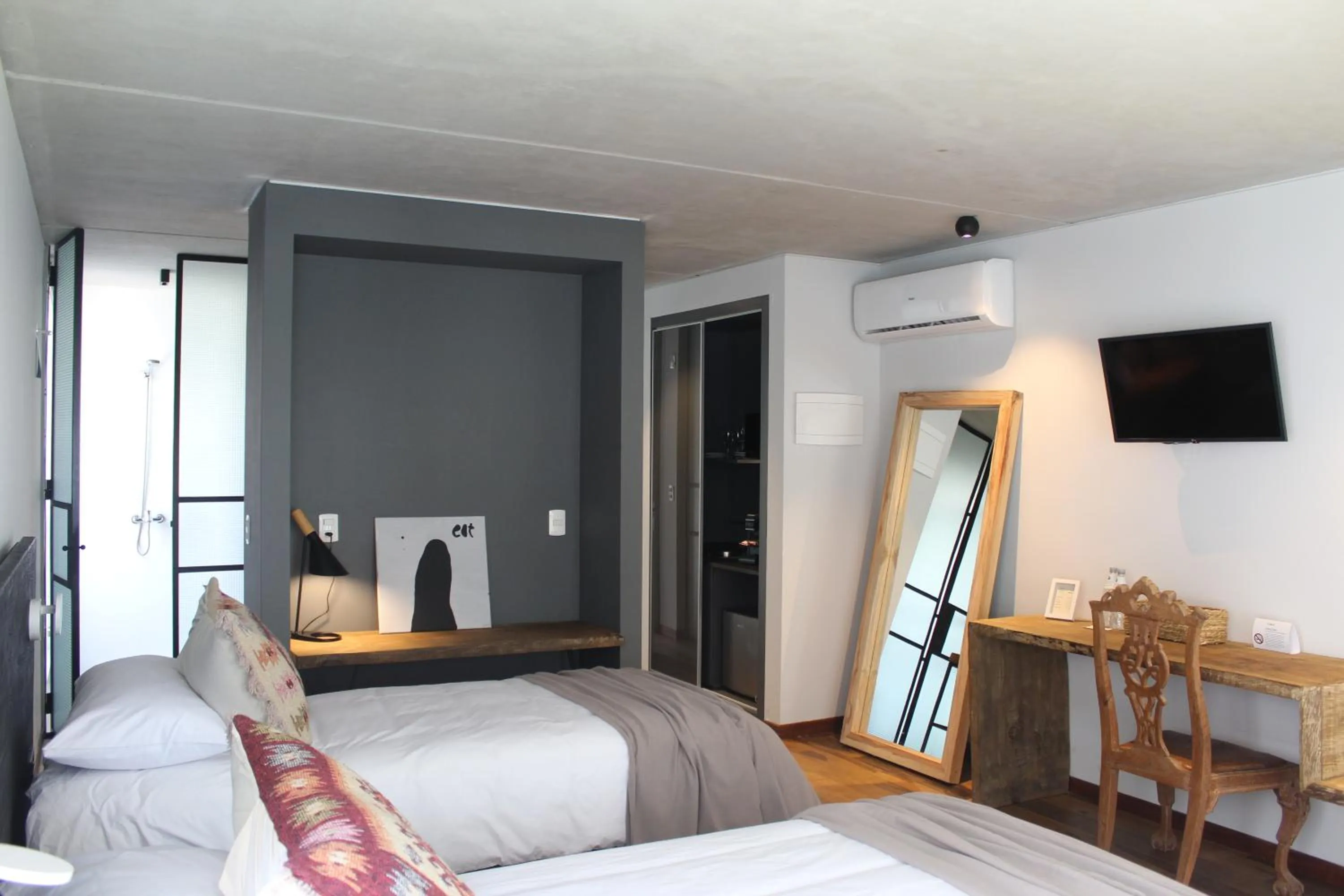 Bed in Be House Suites & Spa