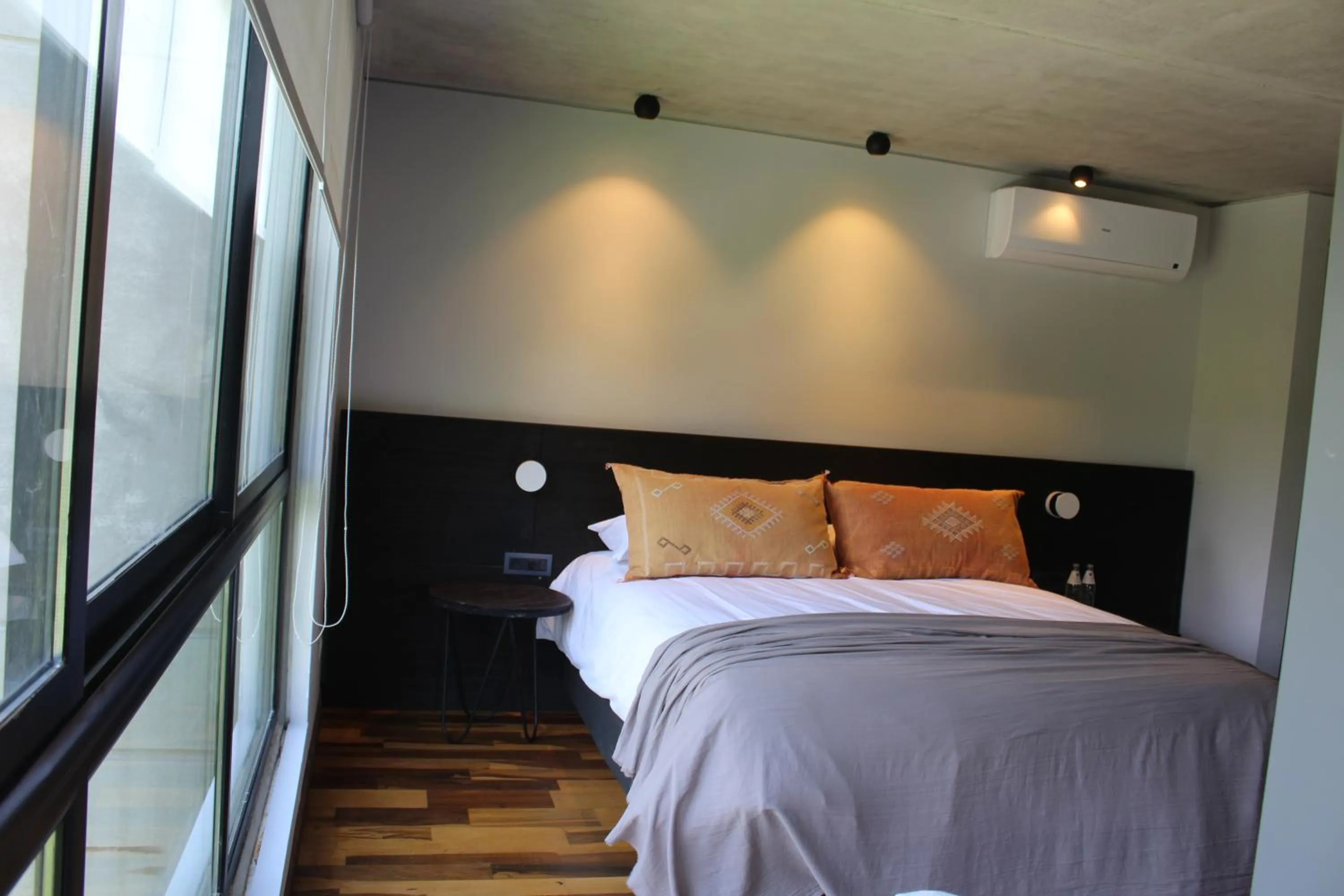 Bed in Be House Suites & Spa