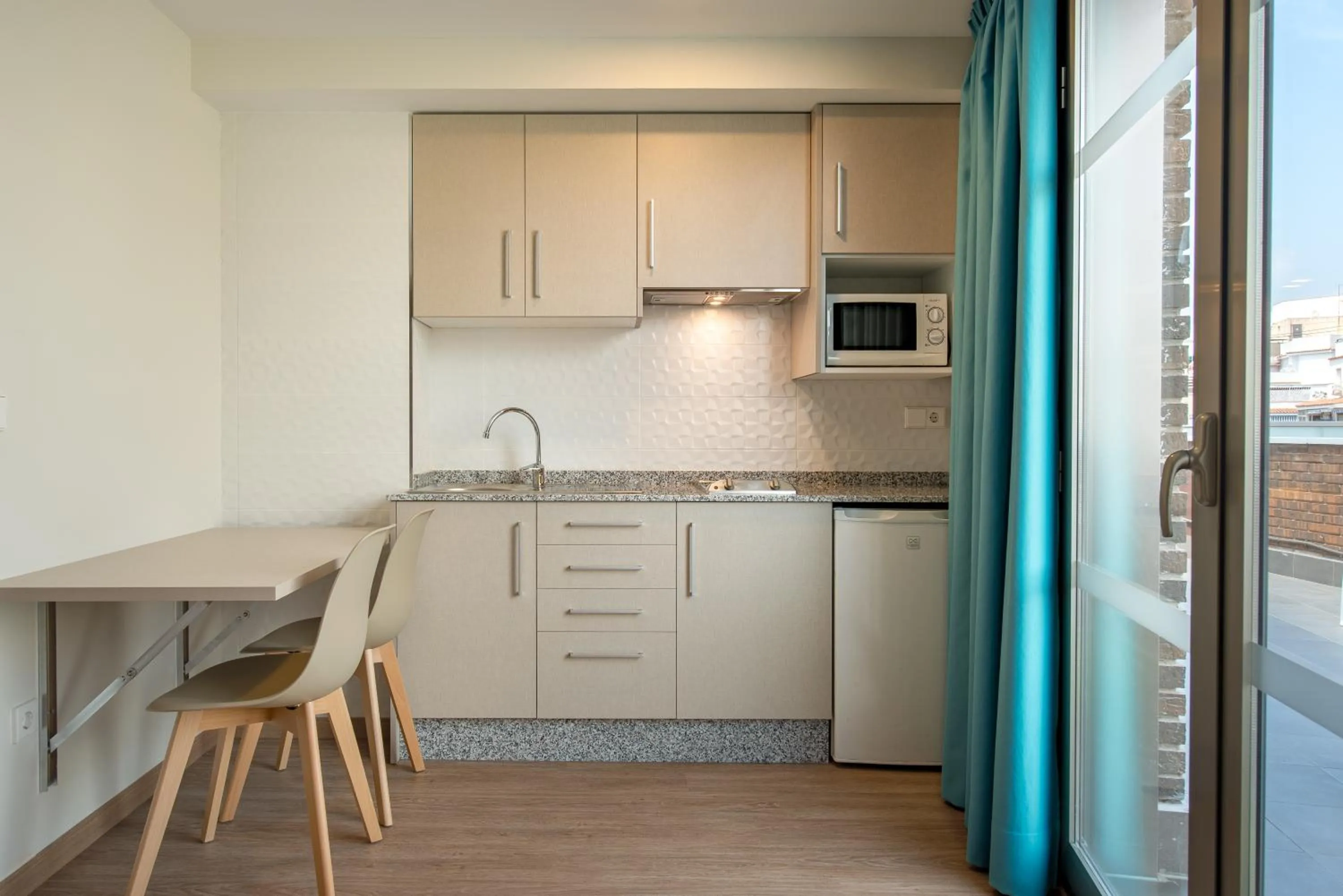 Kitchen or kitchenette in Climia 2Sleep Apartments