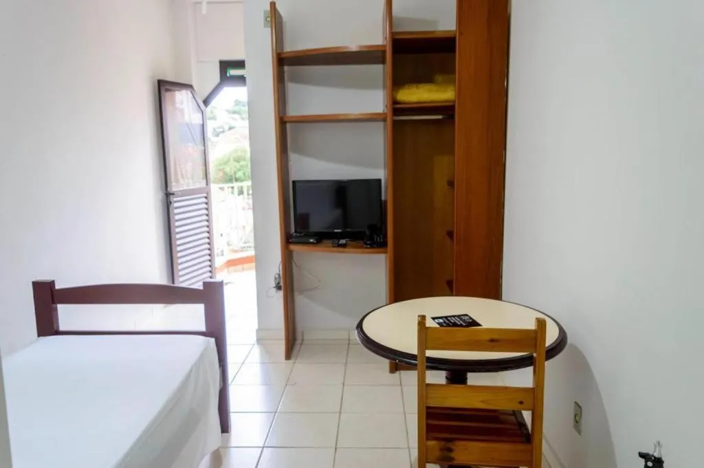 Bed in Bravo Suites São Carlos