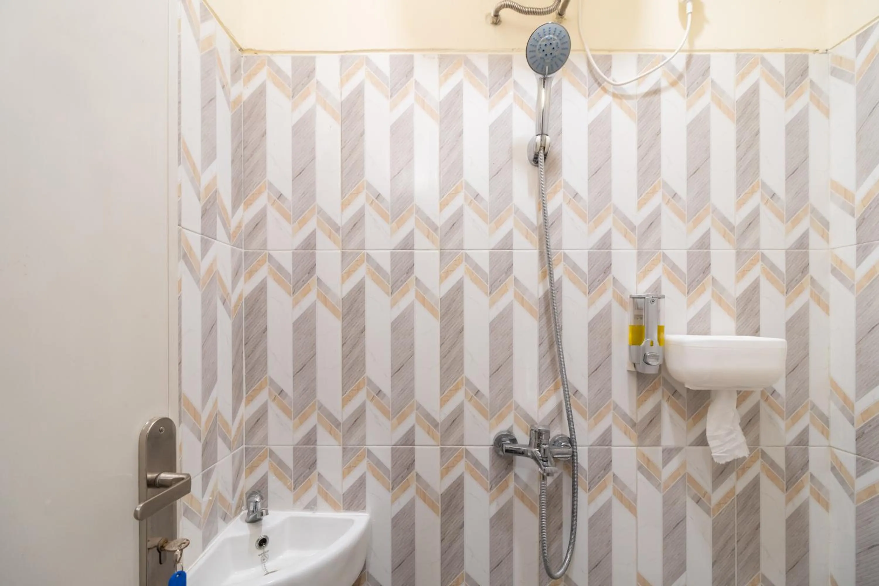 Bathroom in RedDoorz @ Kemanggisan Raya