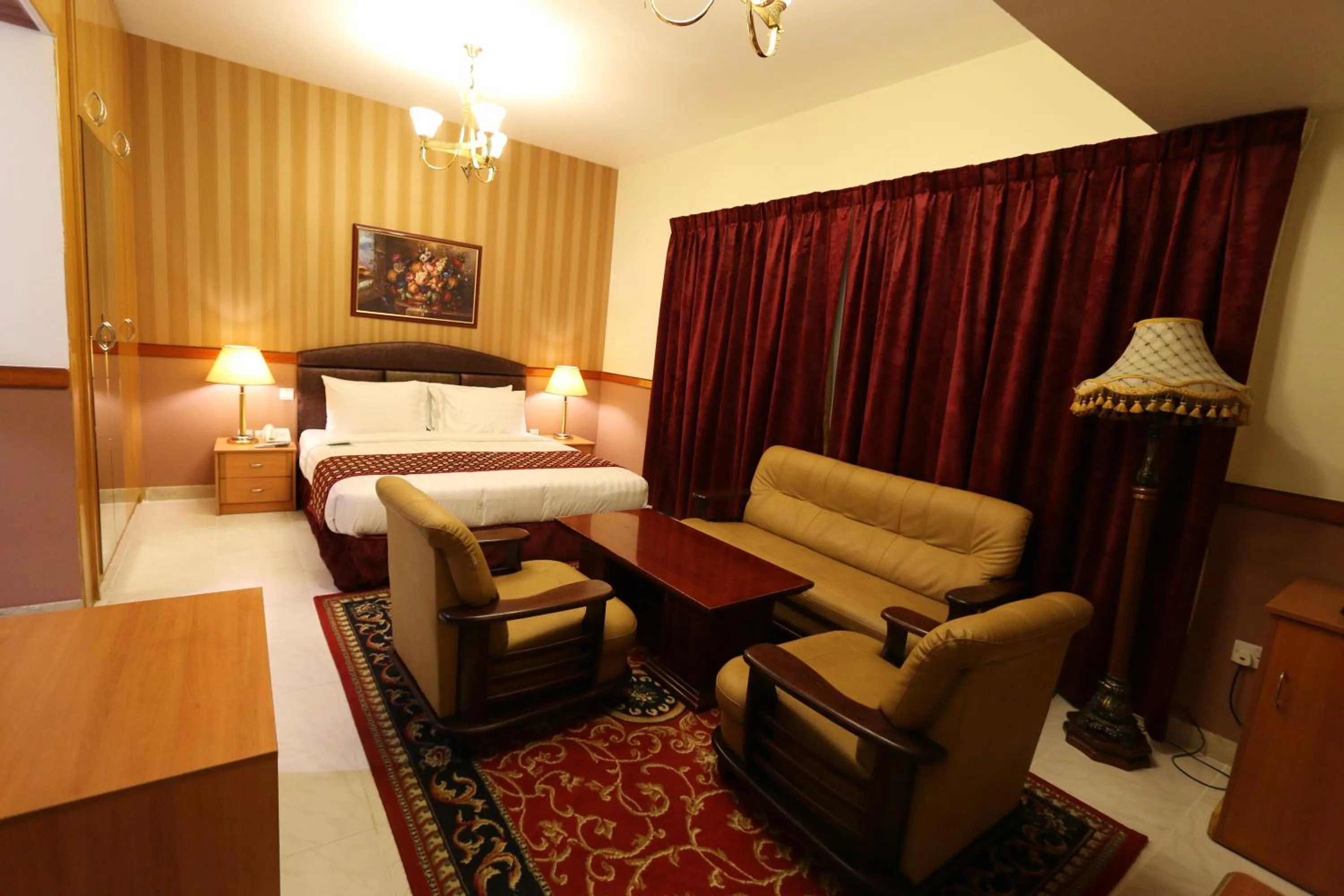 Seating area, Bed in NEW CALIFORNIA HOTEL