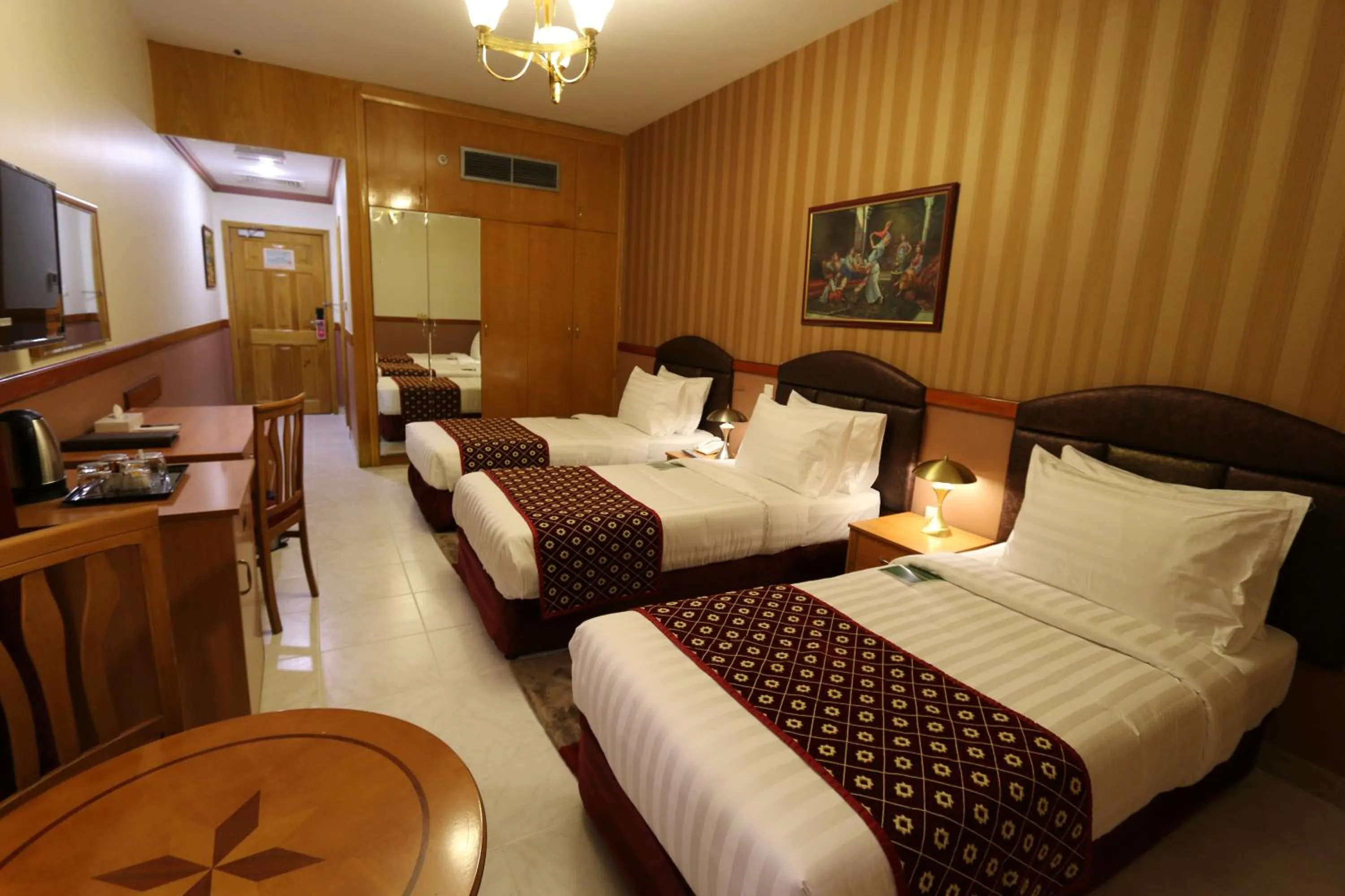 Bed in NEW CALIFORNIA HOTEL