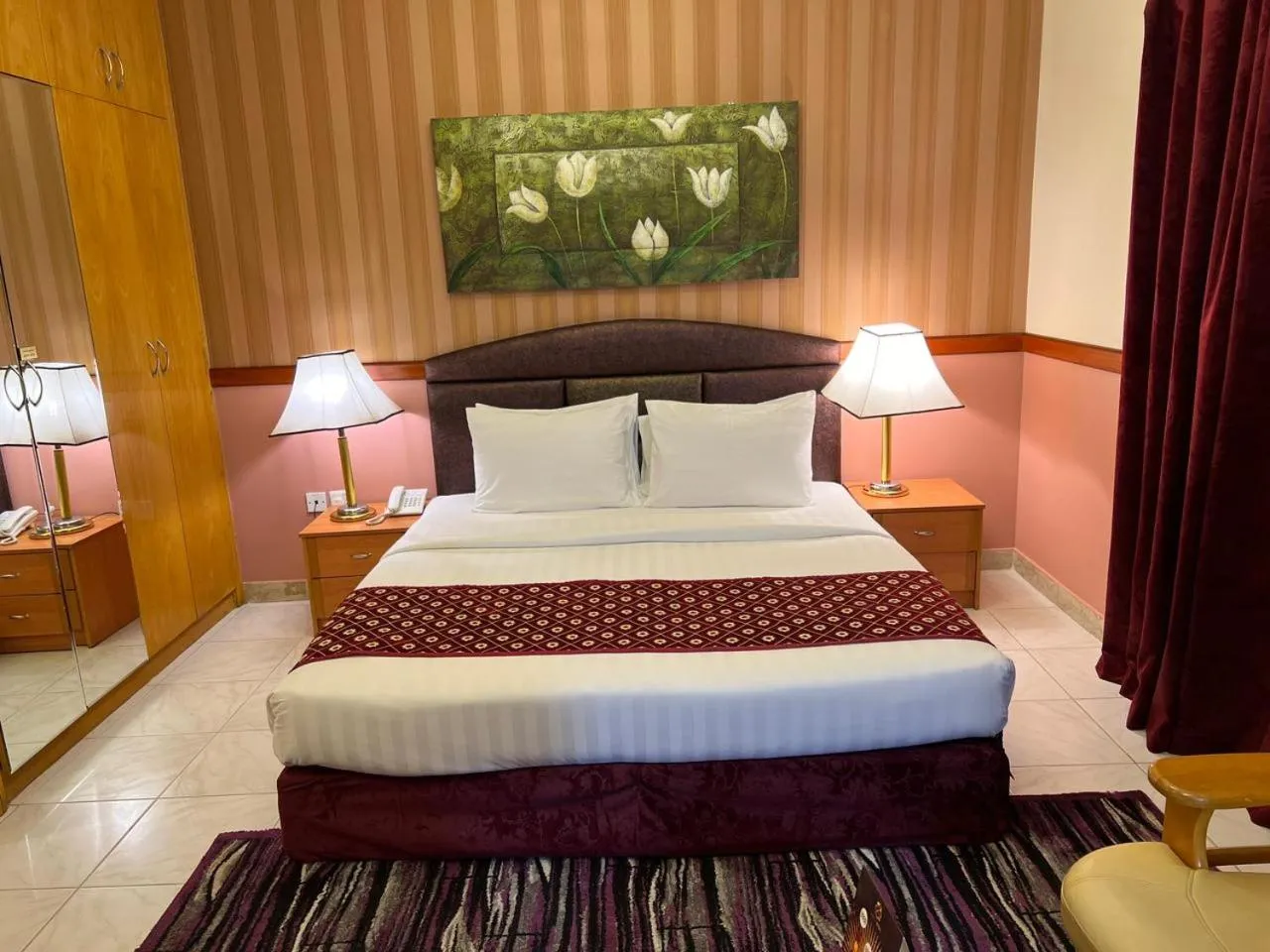 Bed in NEW CALIFORNIA HOTEL