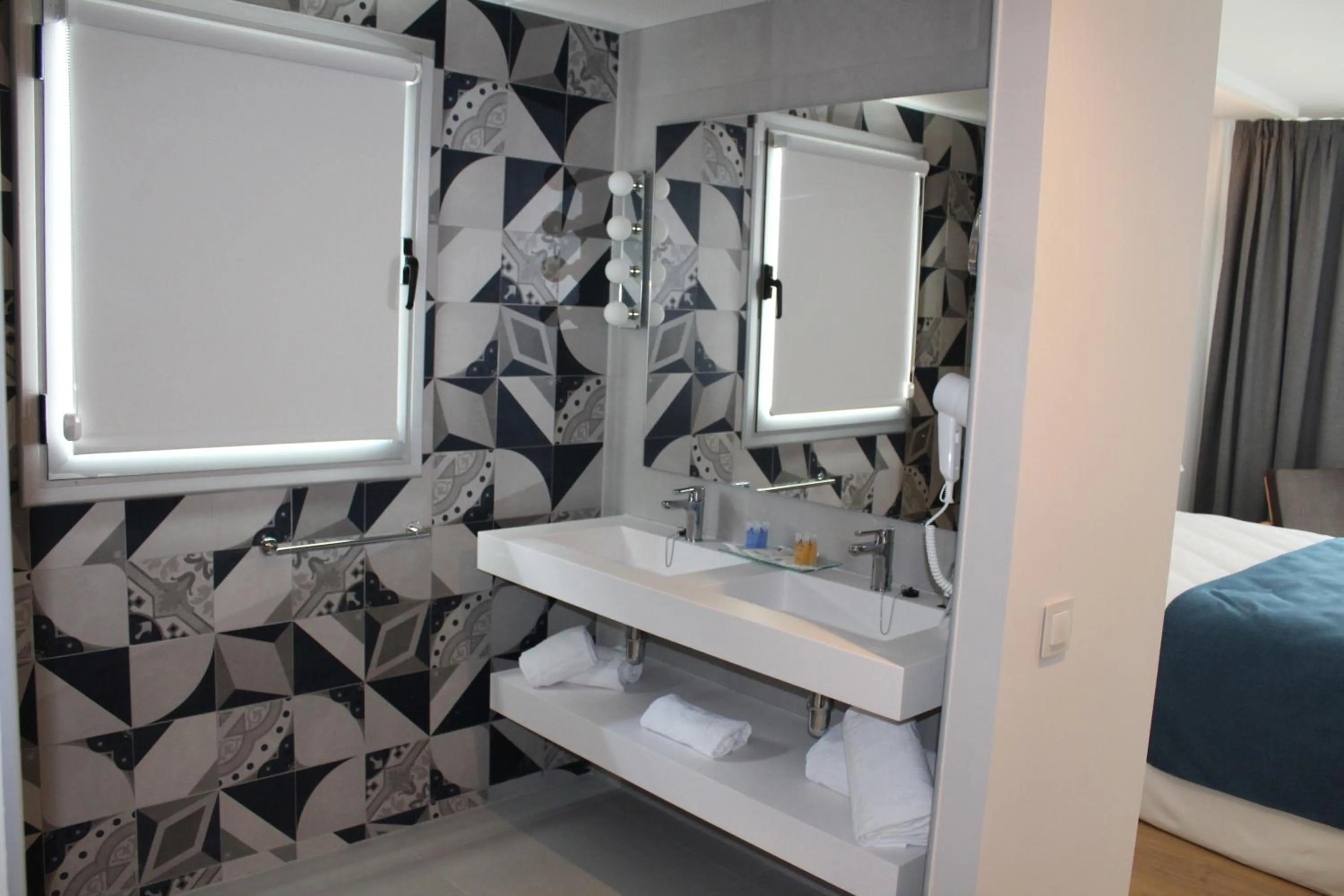 Bathroom, Bed in AQUA Hotel Onabrava & Spa 4*Sup