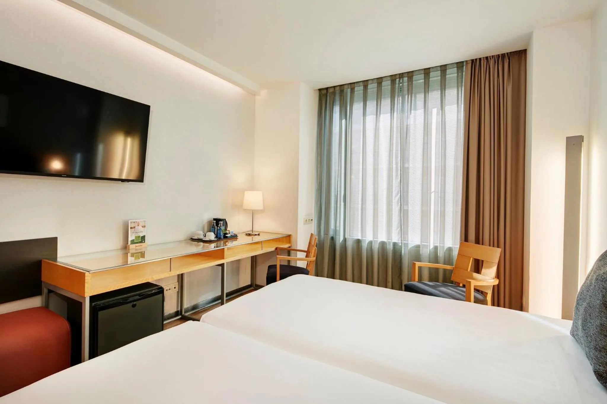 Photo of the whole room, Bed in Sercotel Caspe