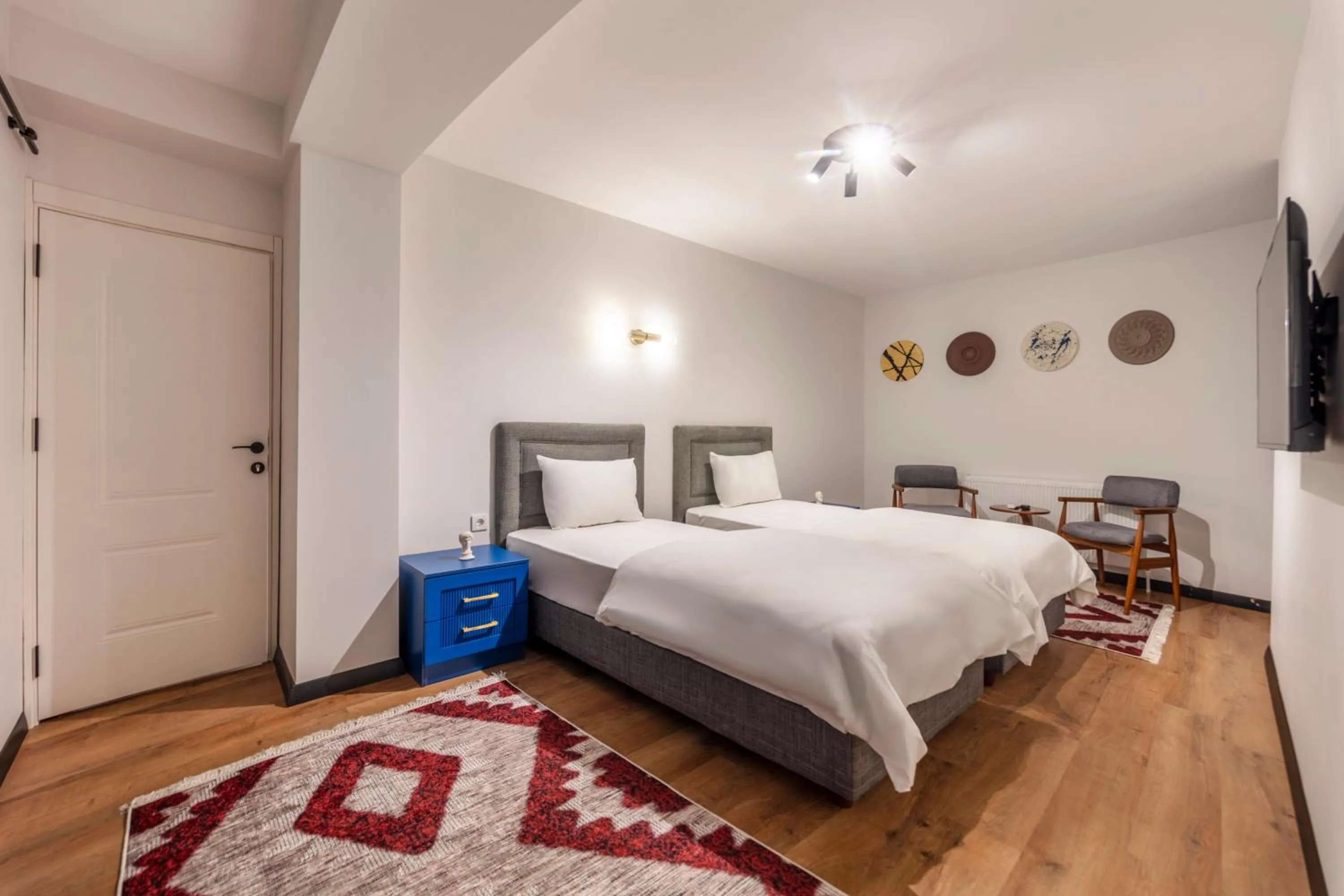 Bed in Hexa Suites Hotel