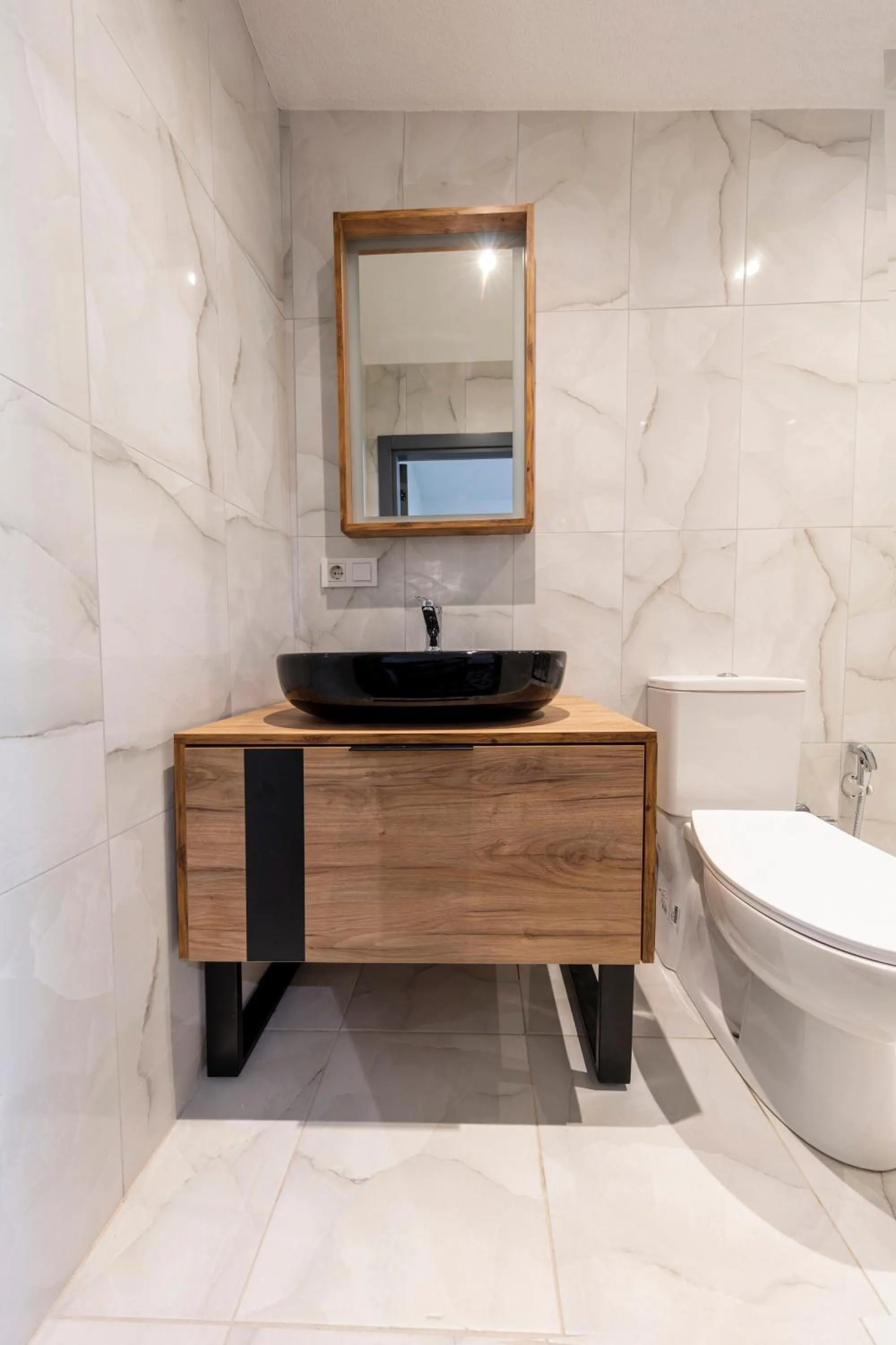 Toilet in Hexa Suites Hotel