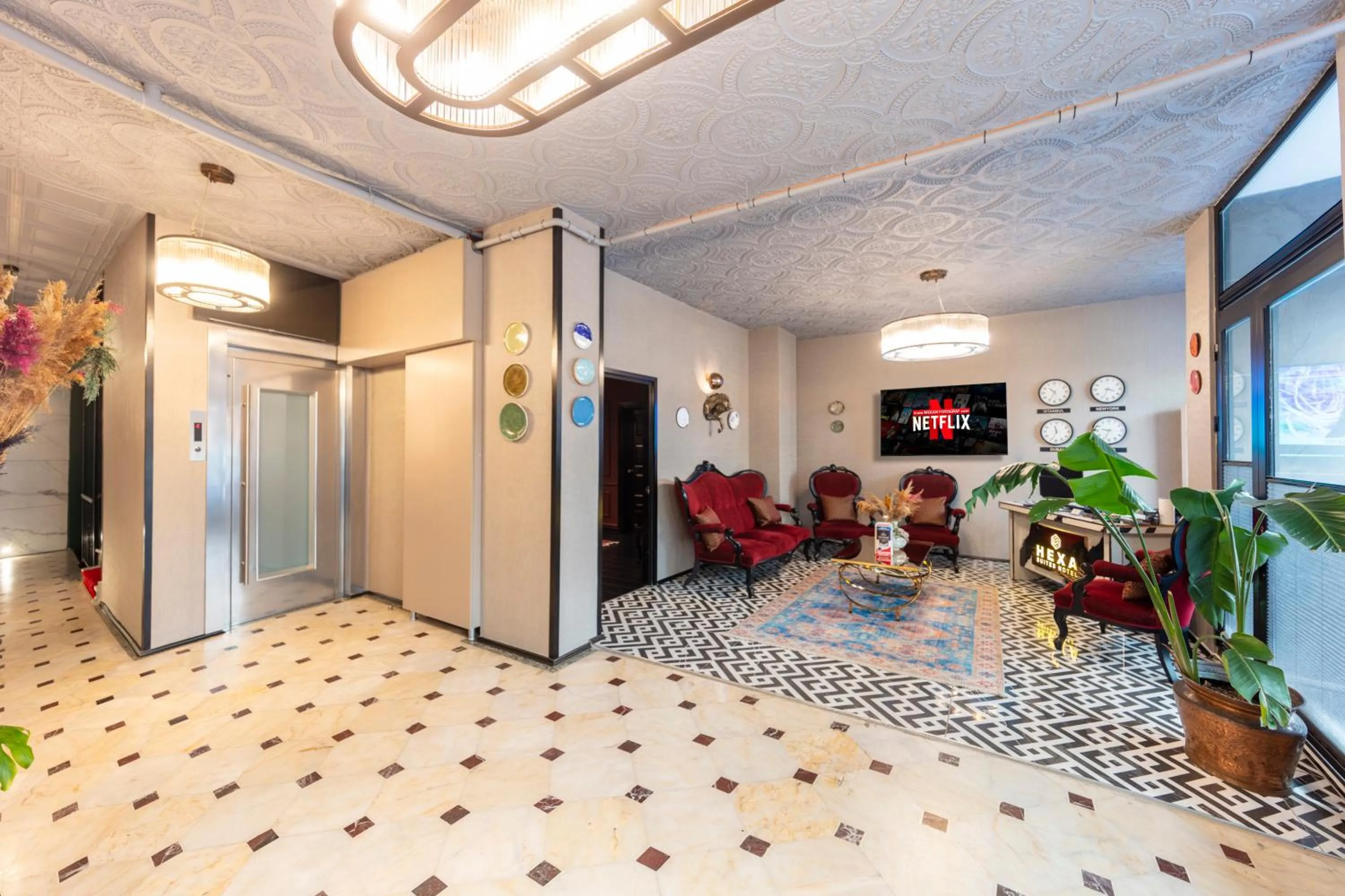 Lobby or reception in Hexa Suites Hotel
