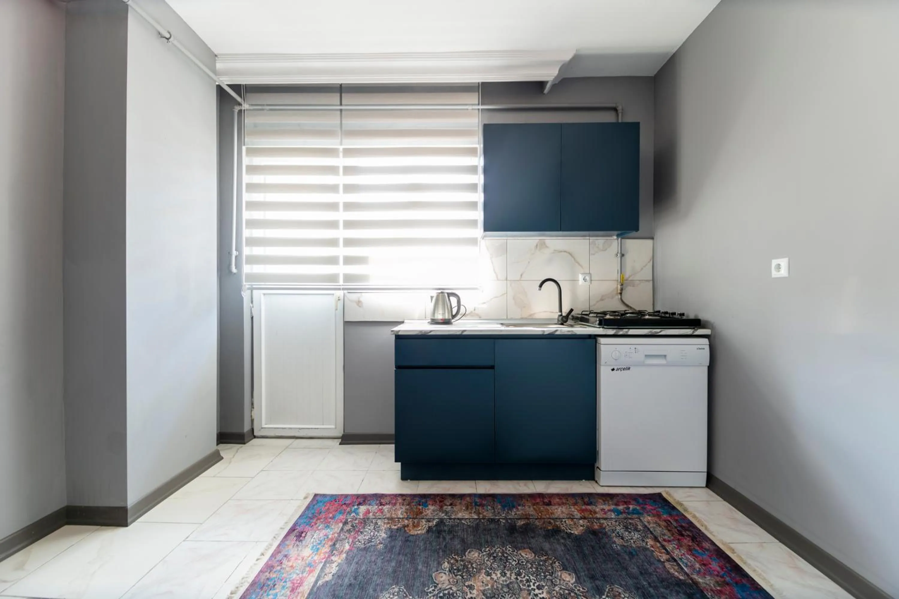 kitchen in Hexa Suites Hotel