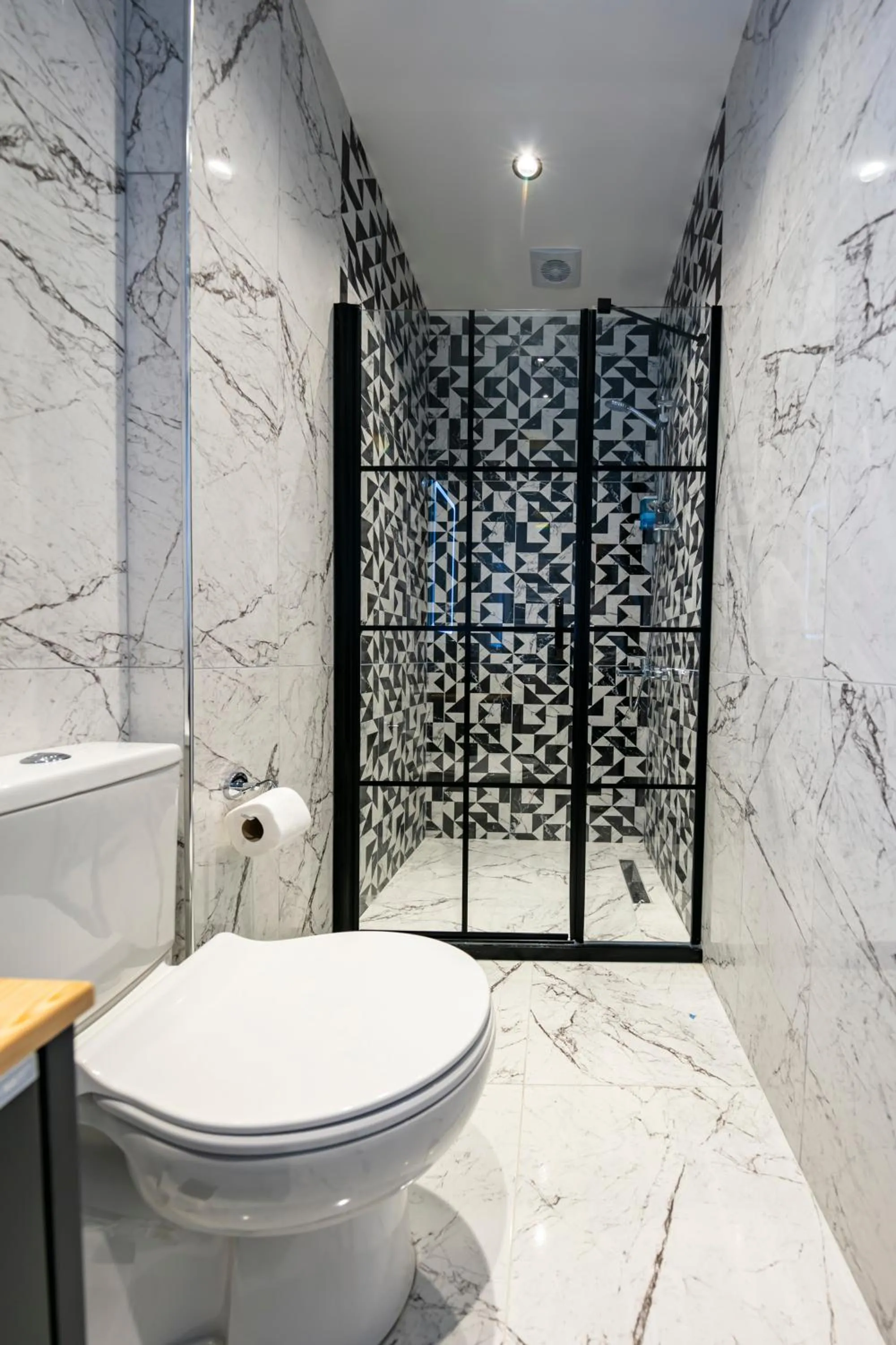 Toilet in Hexa Suites Hotel