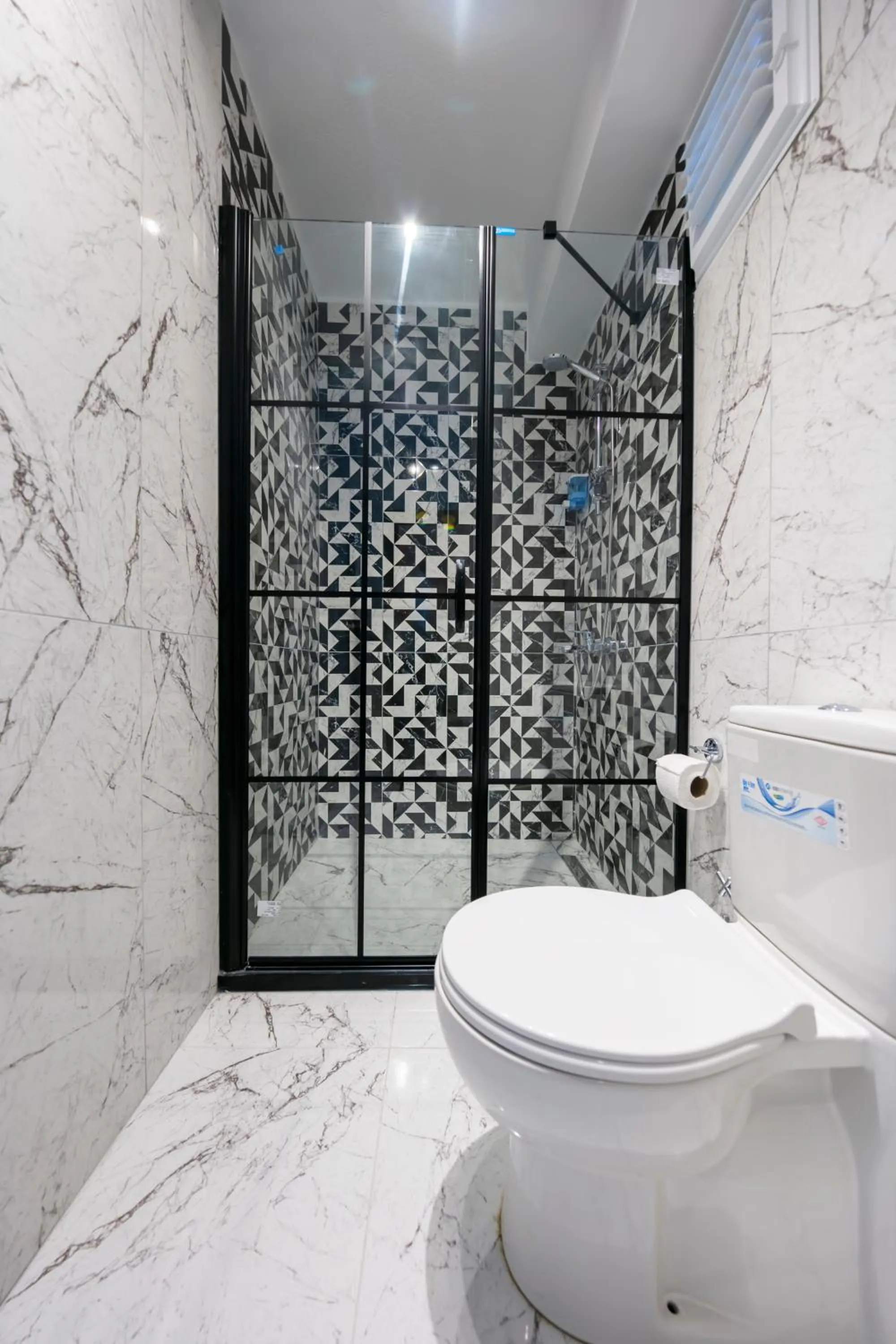 Toilet in Hexa Suites Hotel