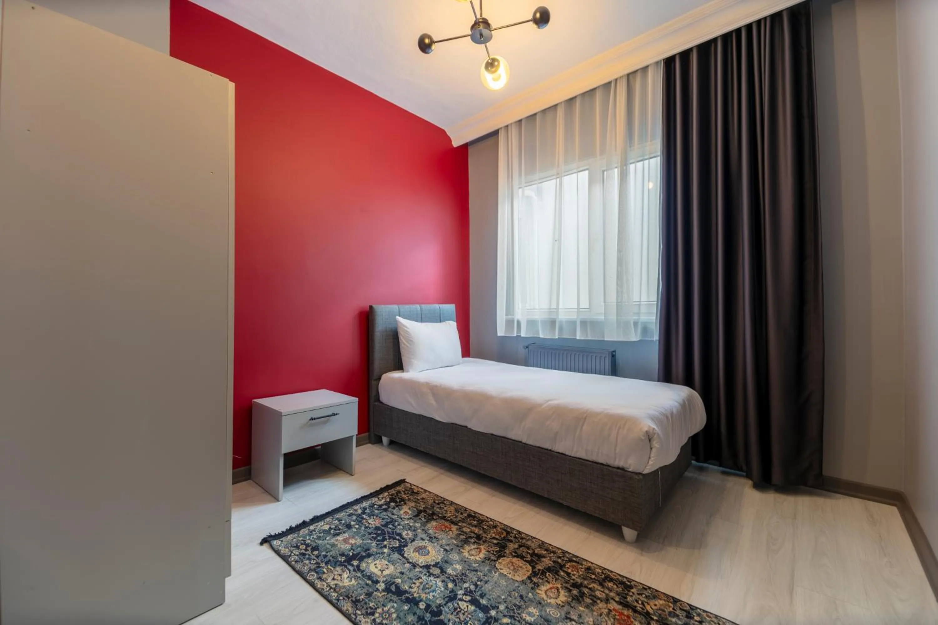 Bed in Hexa Suites Hotel