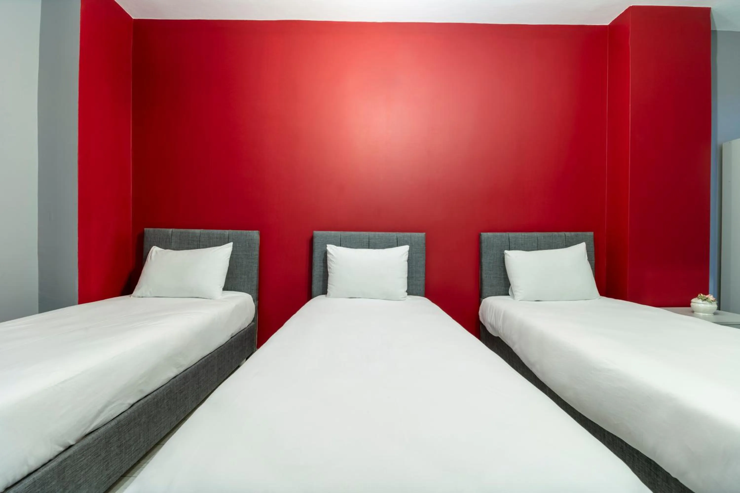 Bed in Hexa Suites Hotel