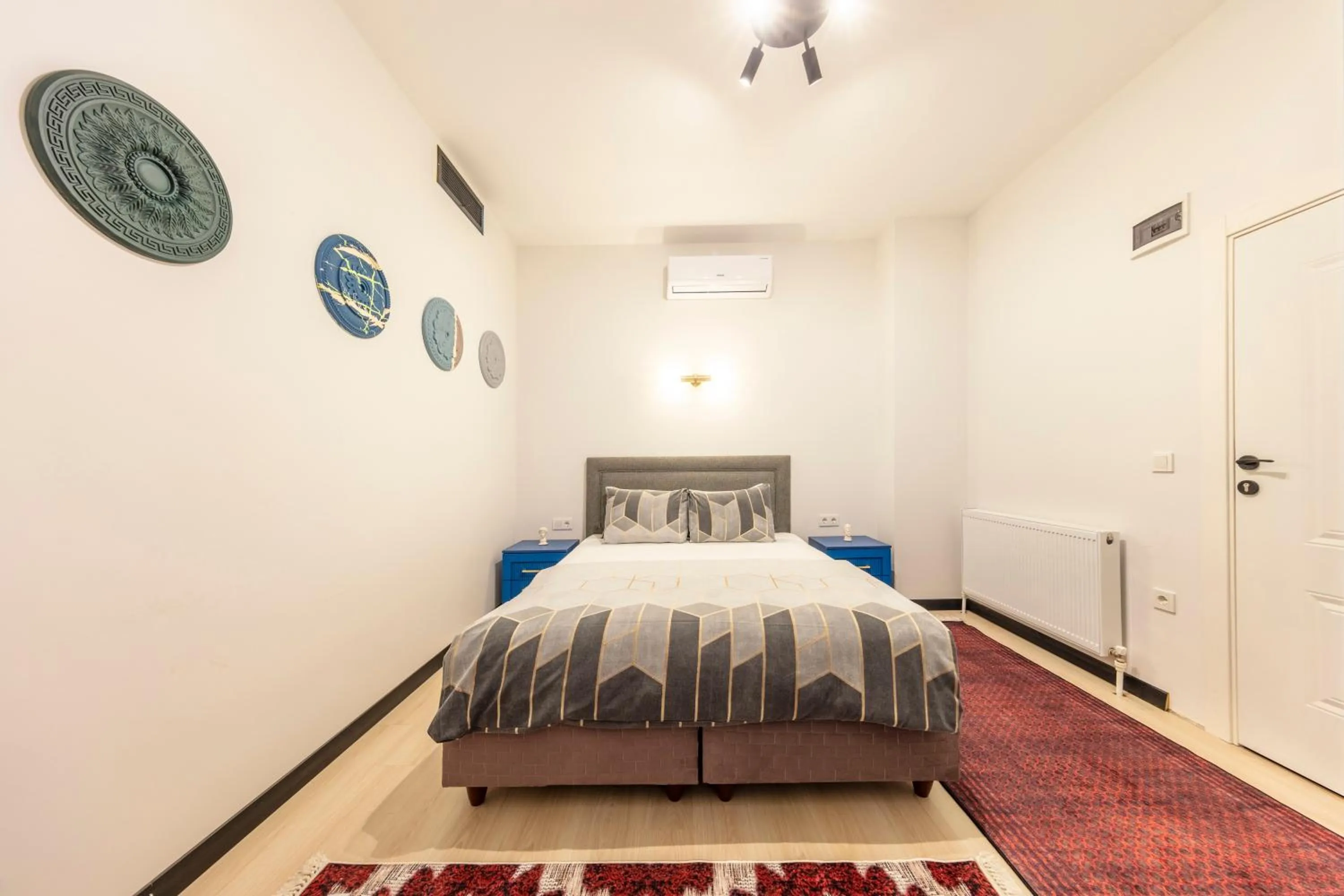 Bed in Hexa Suites Hotel