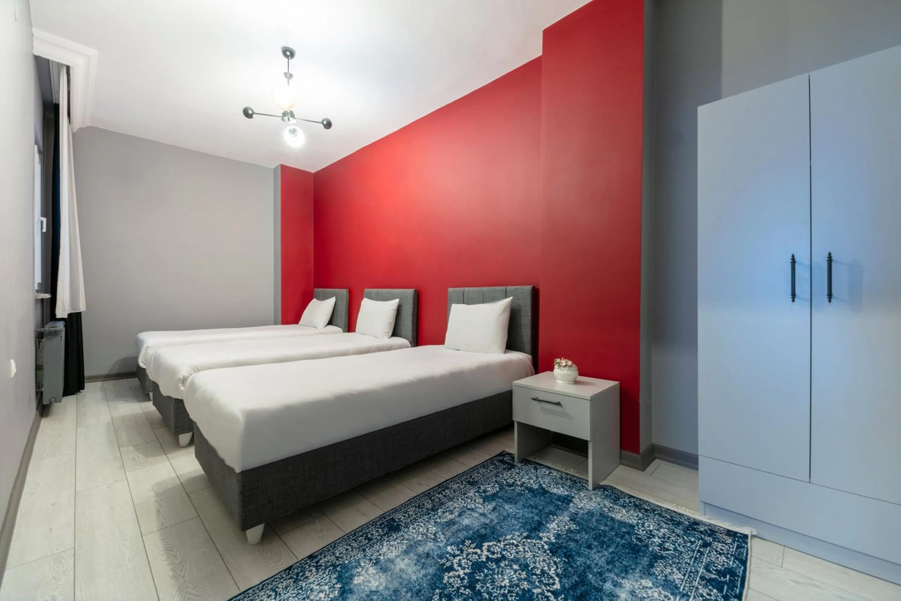 Bed in Hexa Suites Hotel