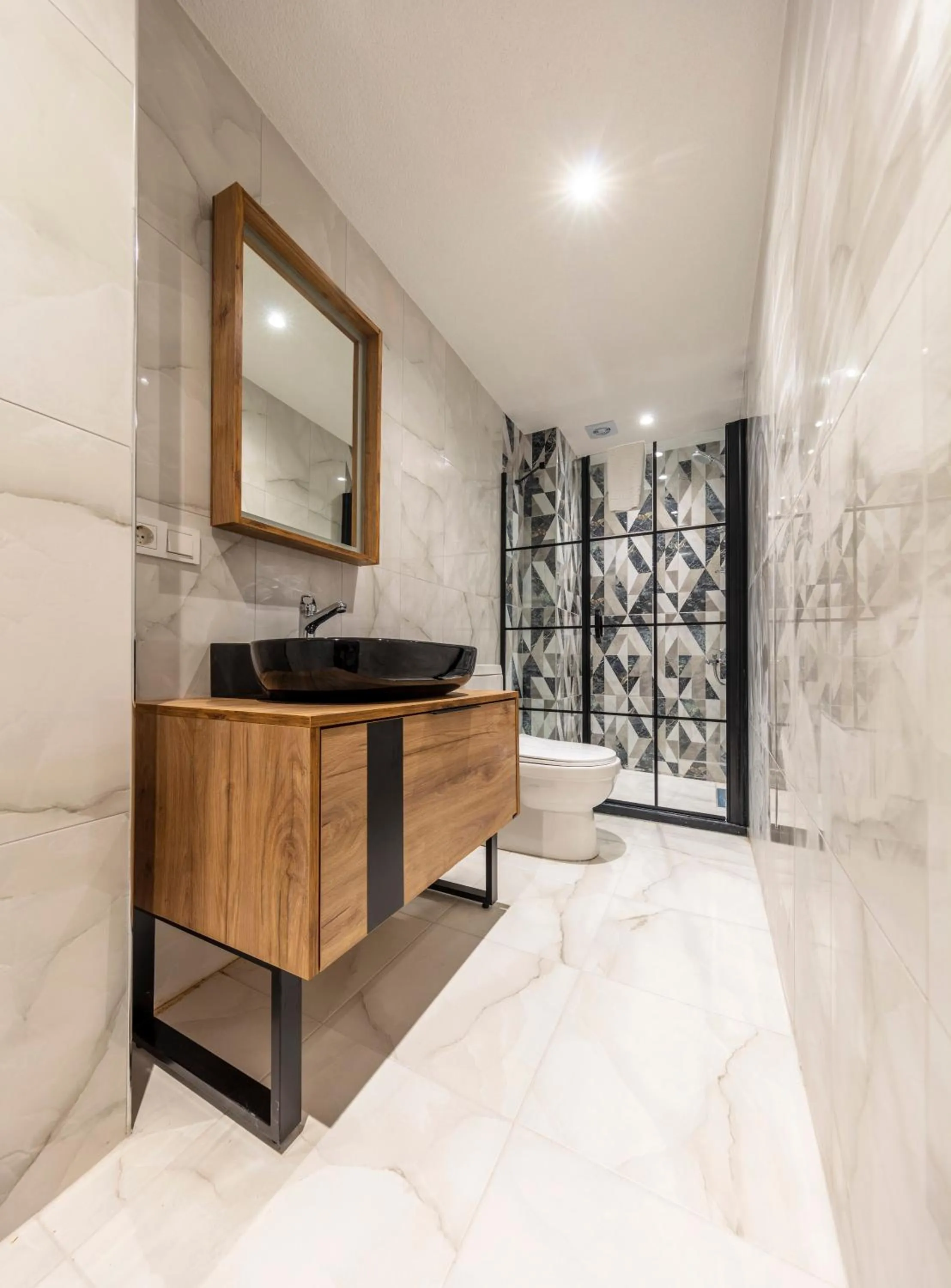 Bathroom in Hexa Suites Hotel