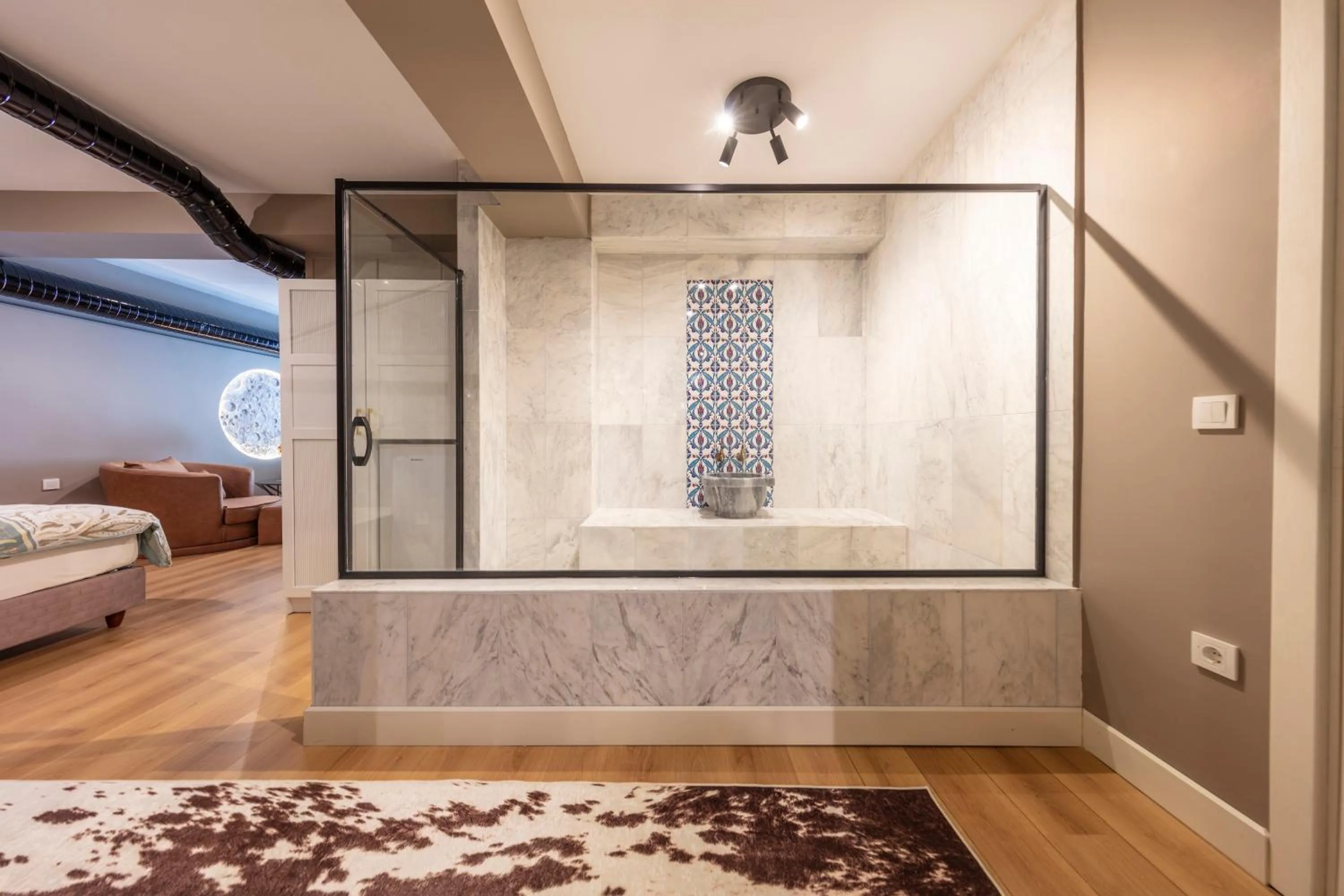 Bed in Hexa Suites Hotel