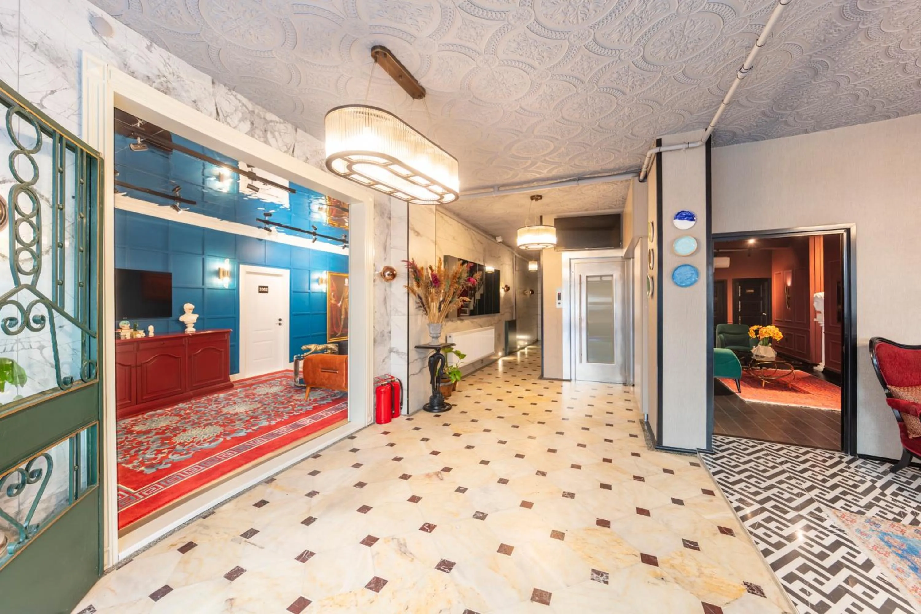 Lobby or reception in Hexa Suites Hotel