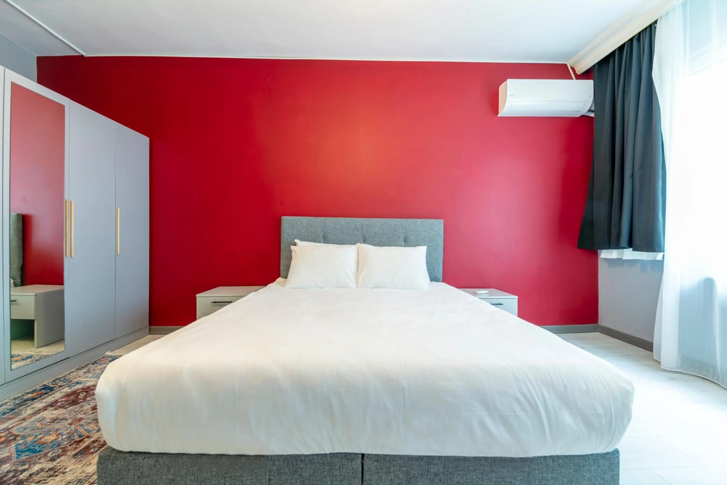 Bed in Hexa Suites Hotel