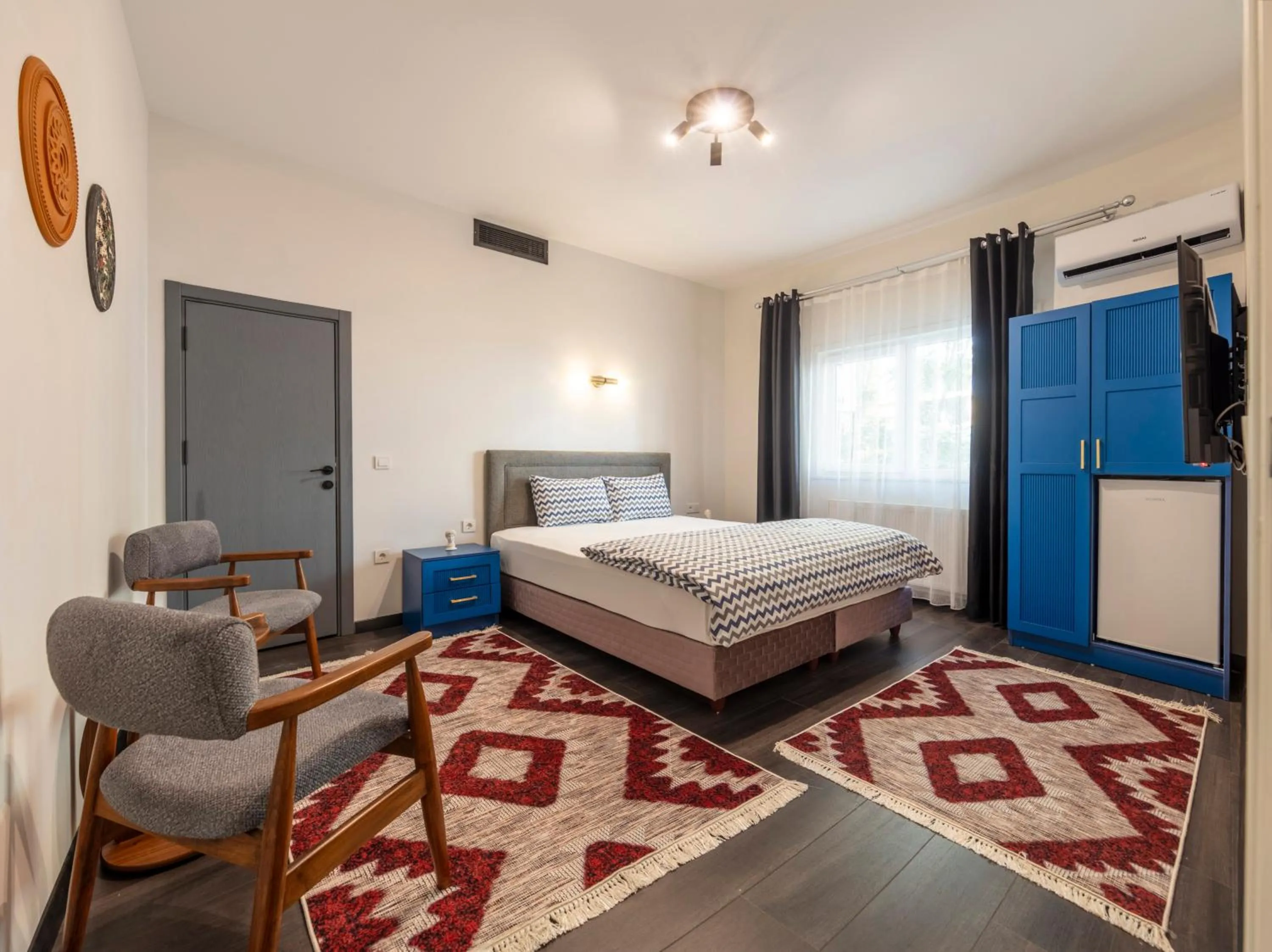 Bed in Hexa Suites Hotel