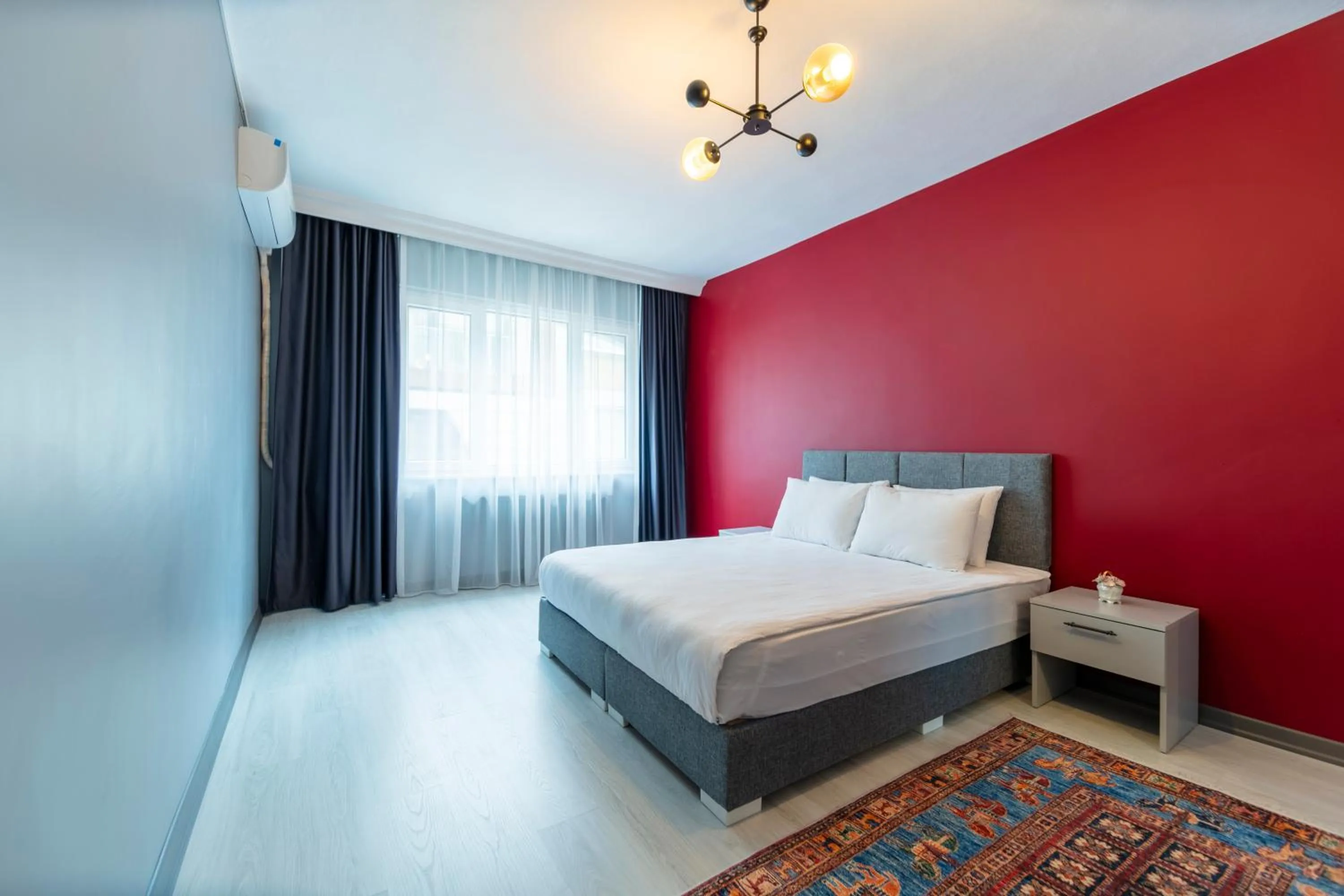 Bed in Hexa Suites Hotel