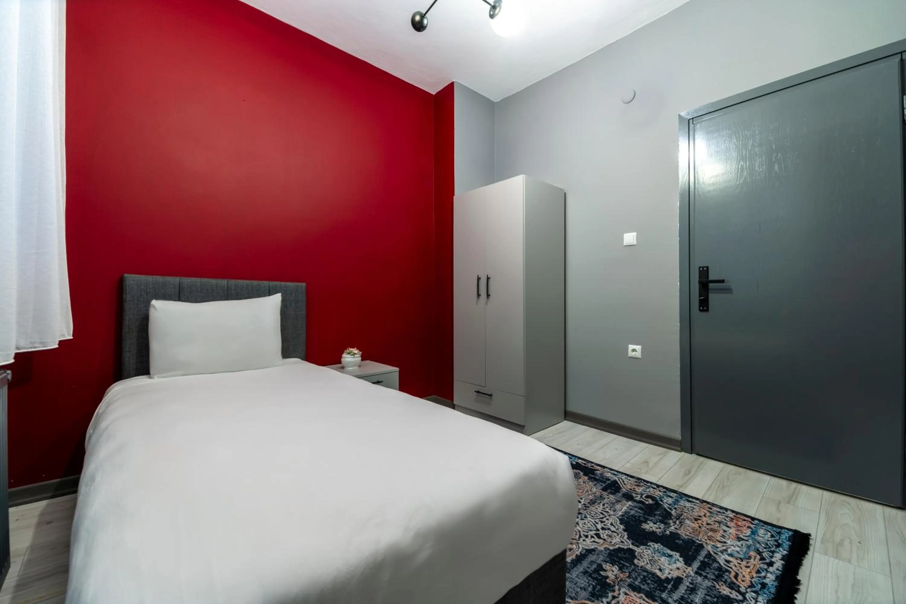 Bed in Hexa Suites Hotel