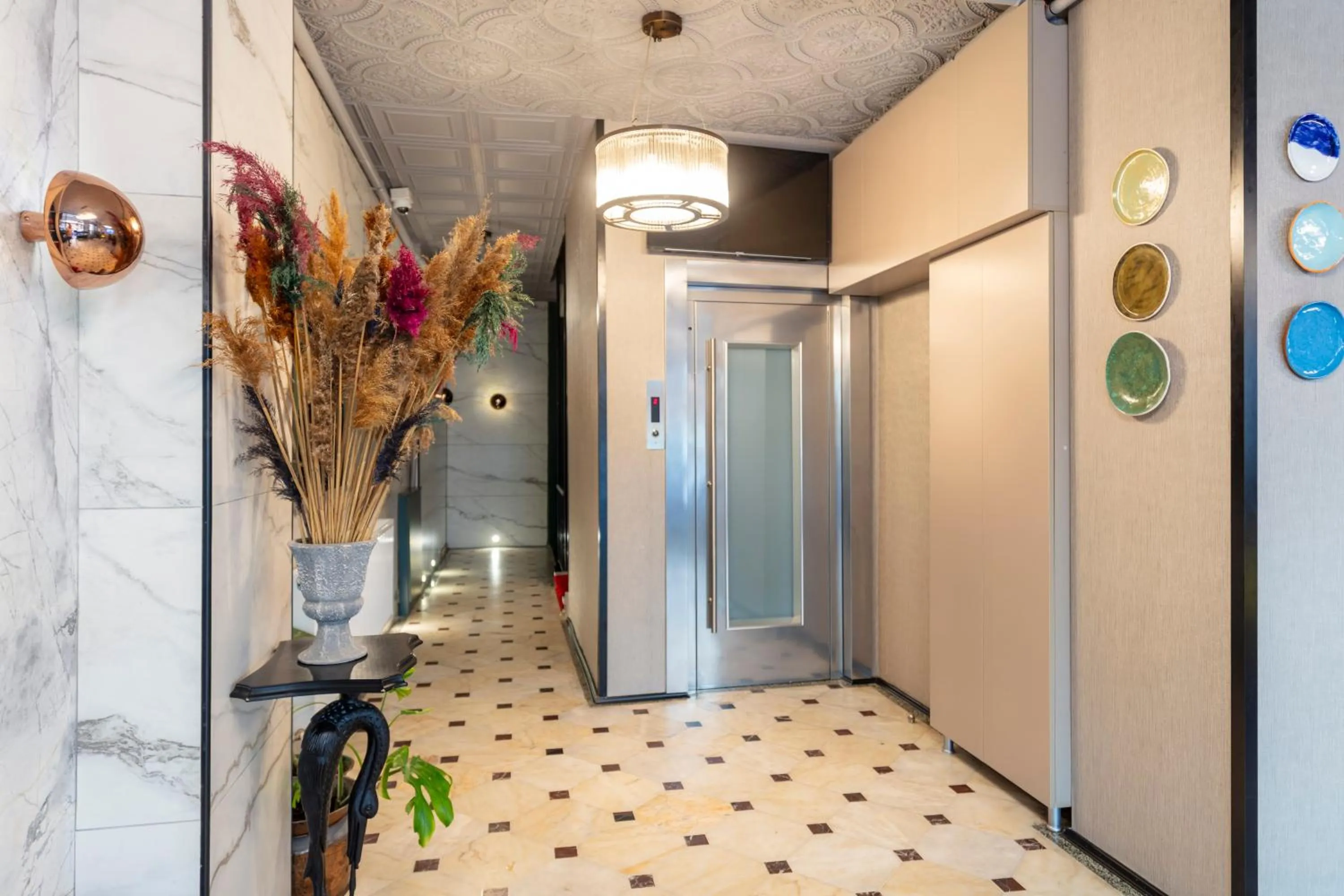 Lobby or reception in Hexa Suites Hotel