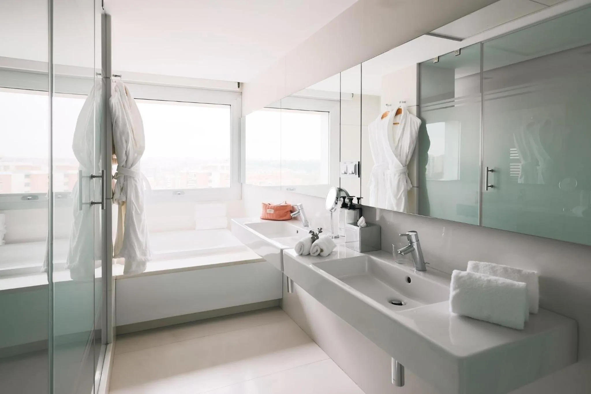 Bathroom in voco Madrid Retiro by IHG