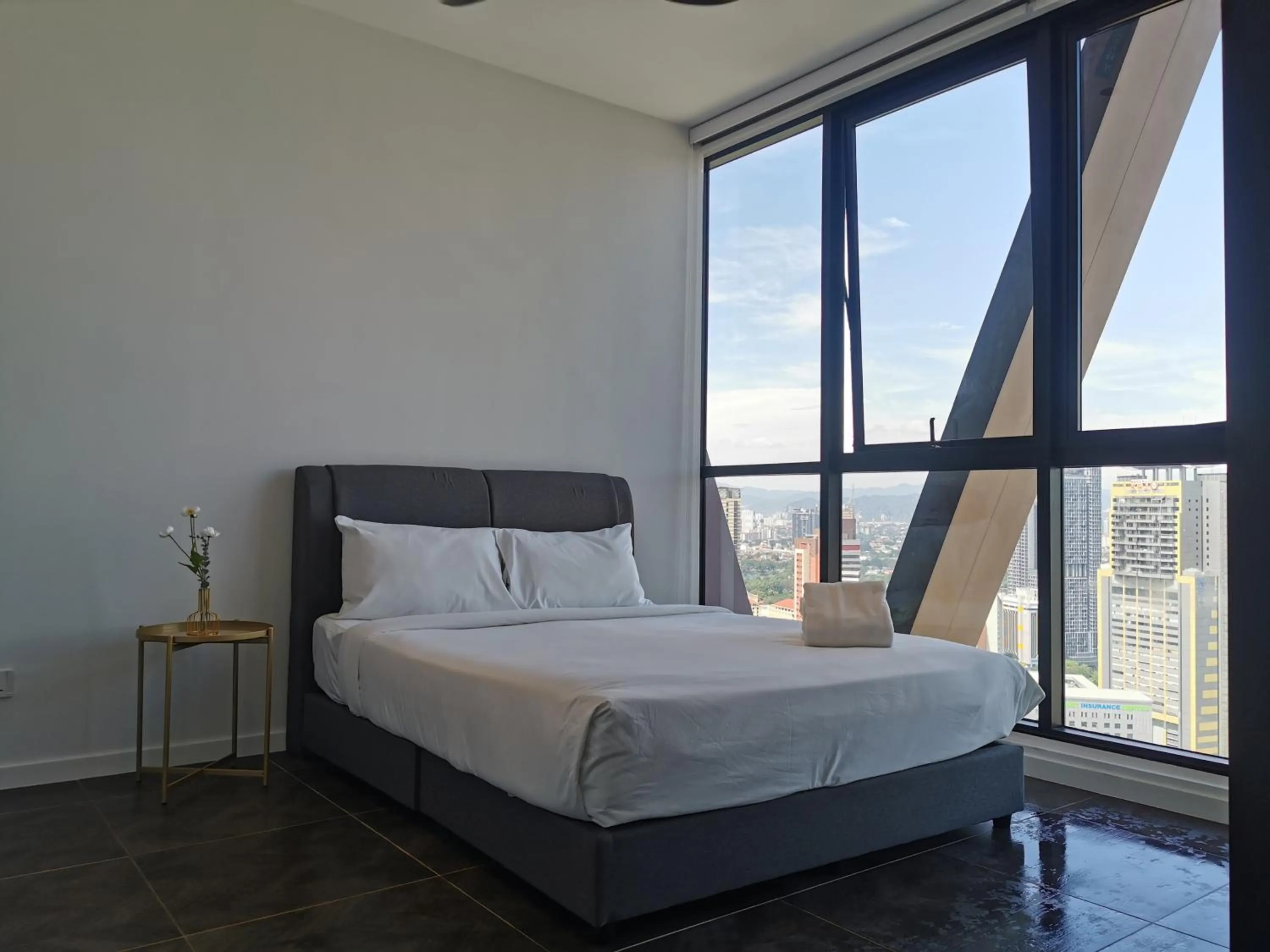 Bed in Scarletz Suites KLCC by De Harlequins Guesthouse