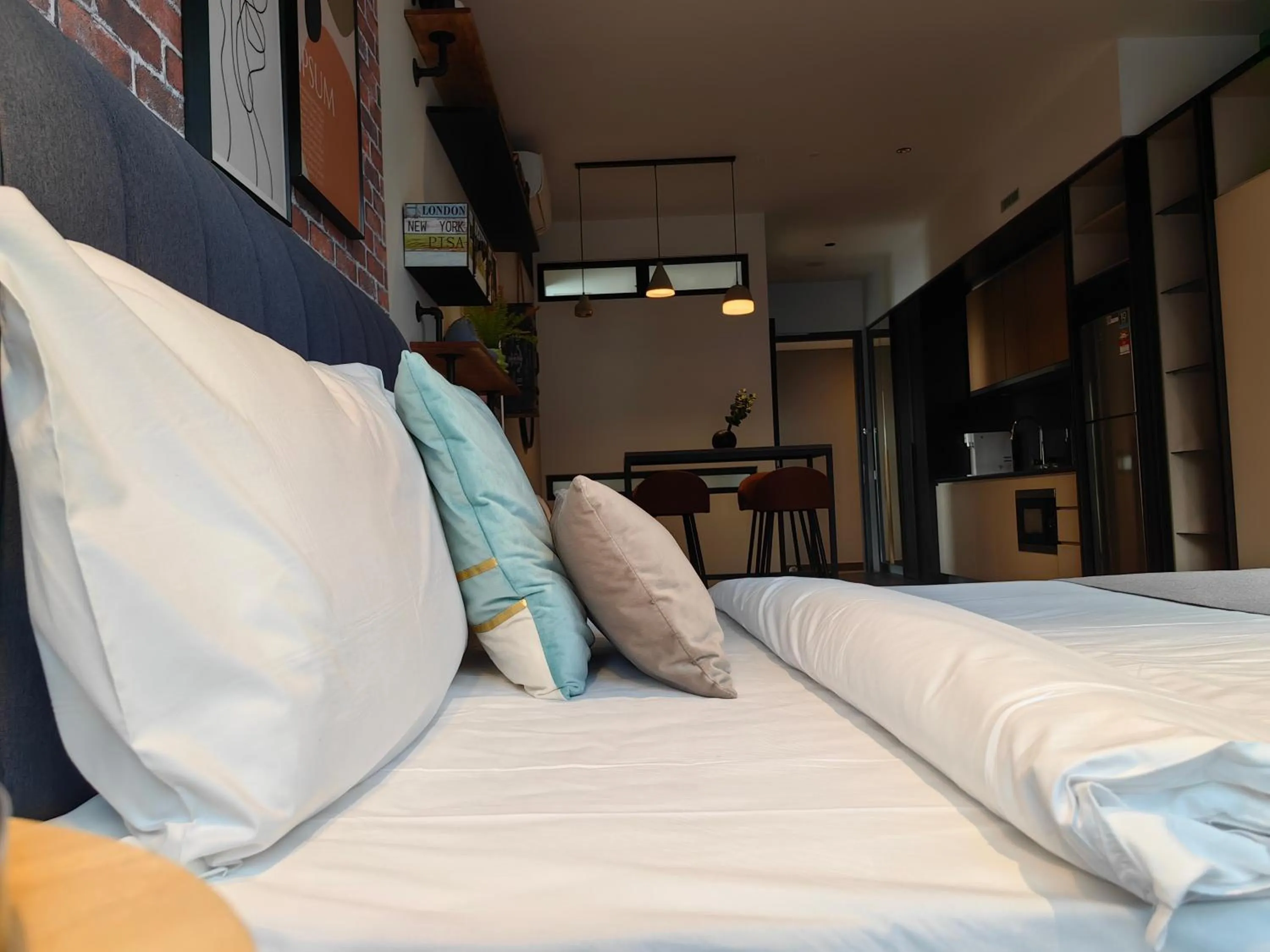 Bed in Scarletz Suites KLCC by De Harlequins Guesthouse