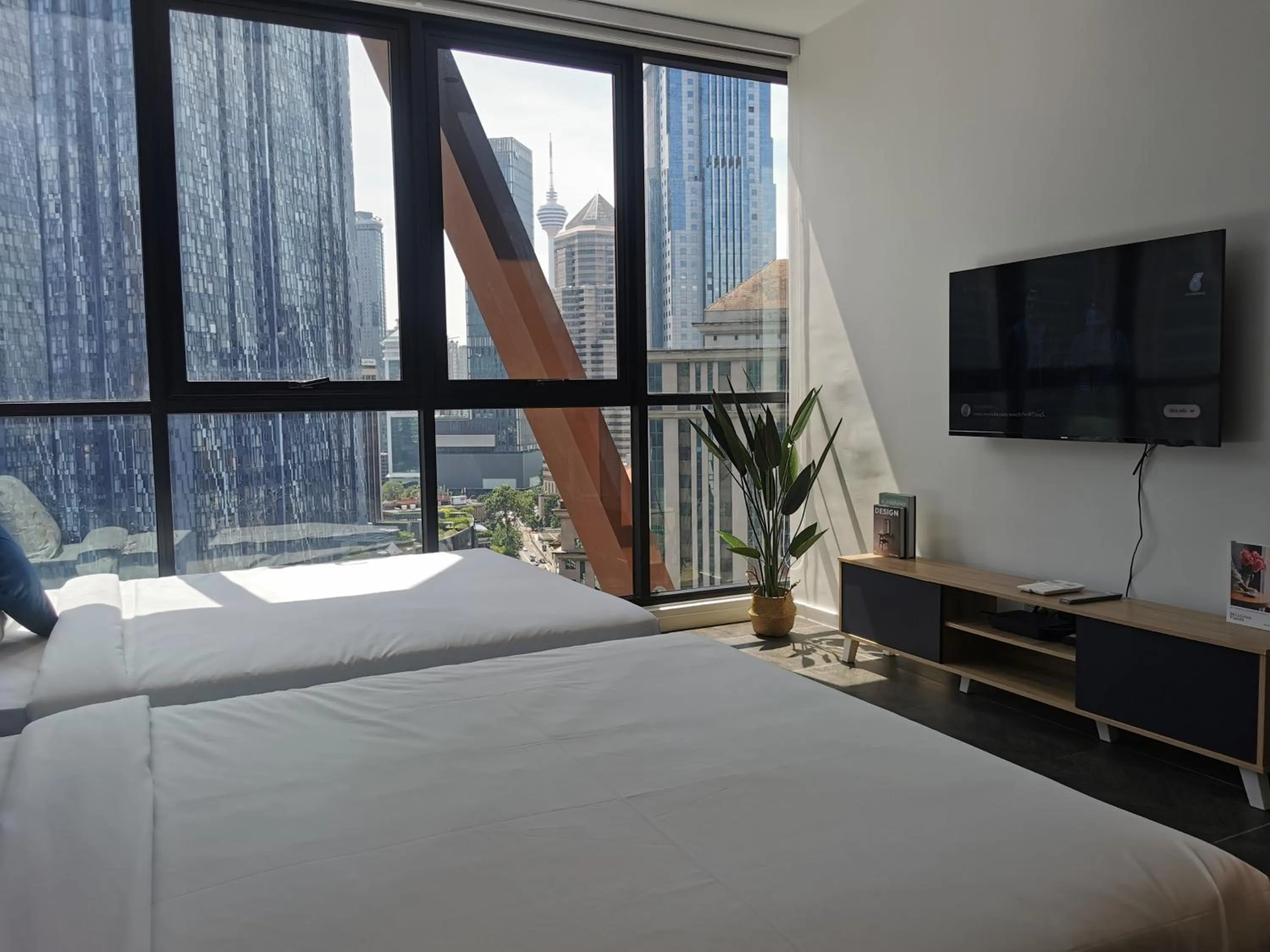 Bed in Scarletz Suites KLCC by De Harlequins Guesthouse