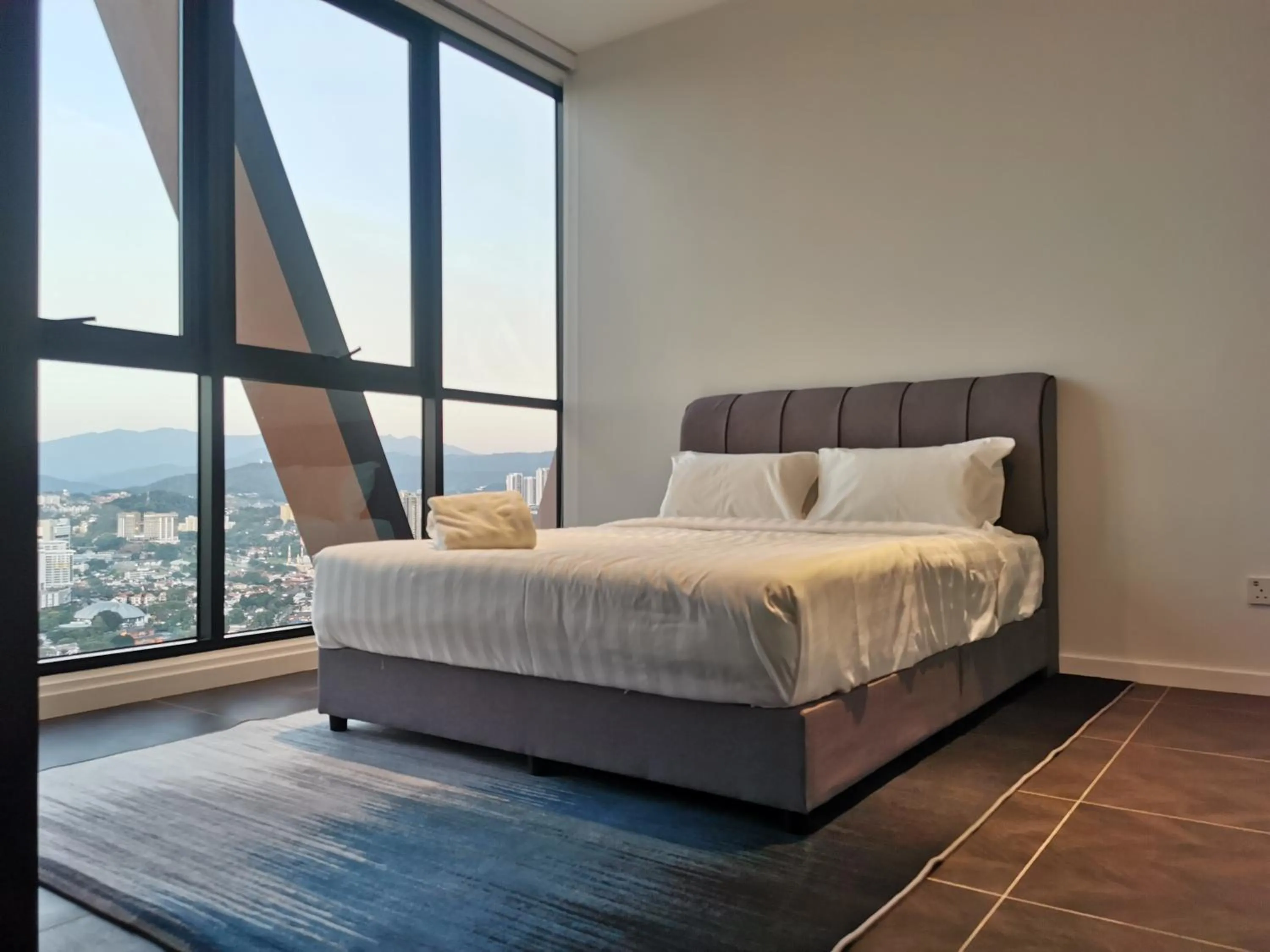 Bed in Scarletz Suites KLCC by De Harlequins Guesthouse