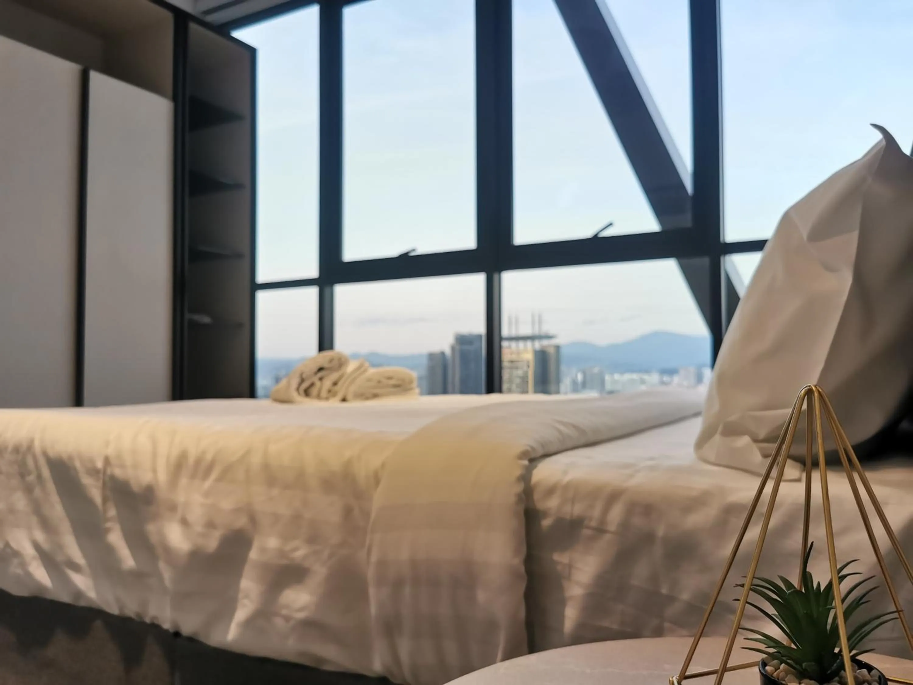 Bed in Scarletz Suites KLCC by De Harlequins Guesthouse