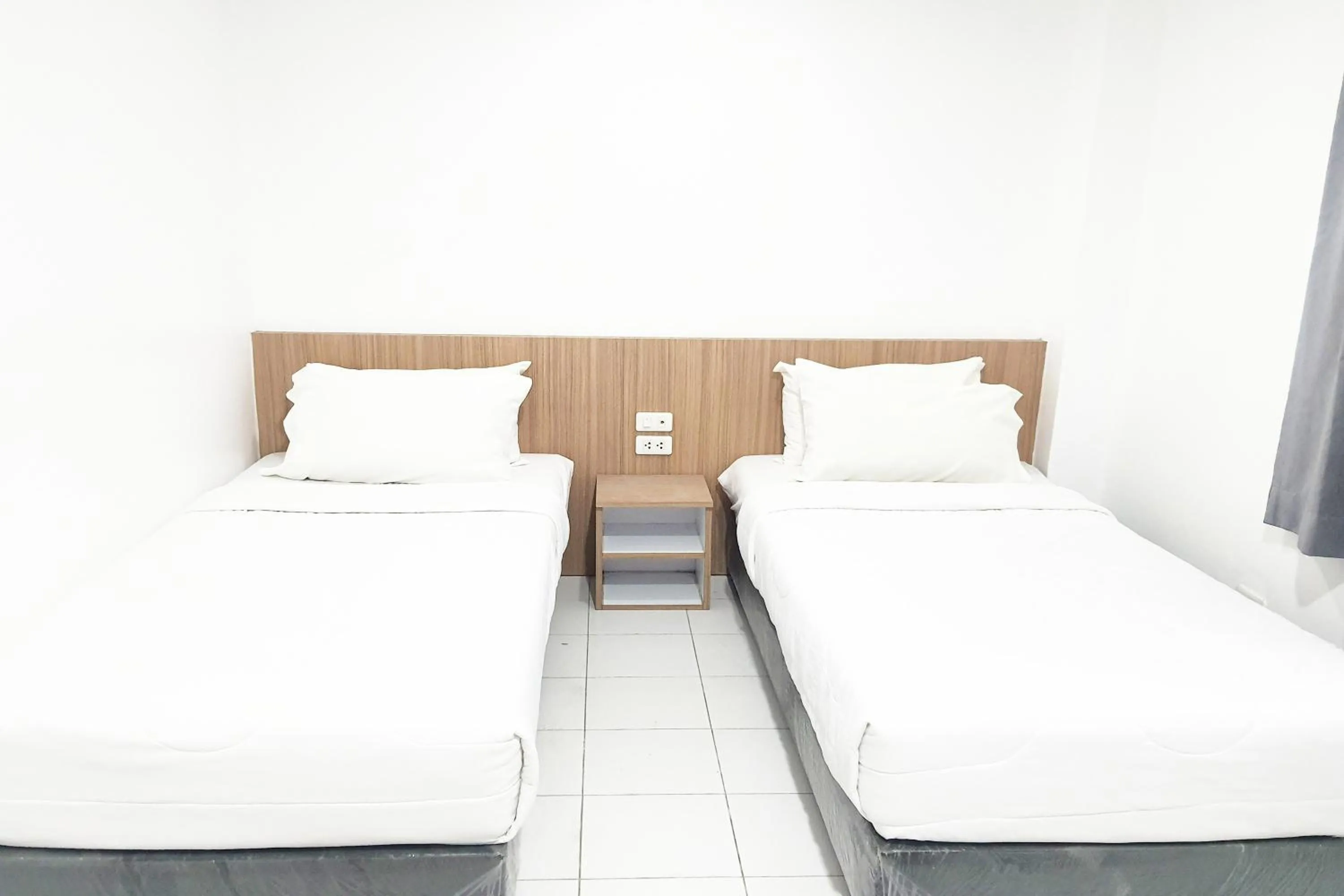 Bed in Patong Bay Inn