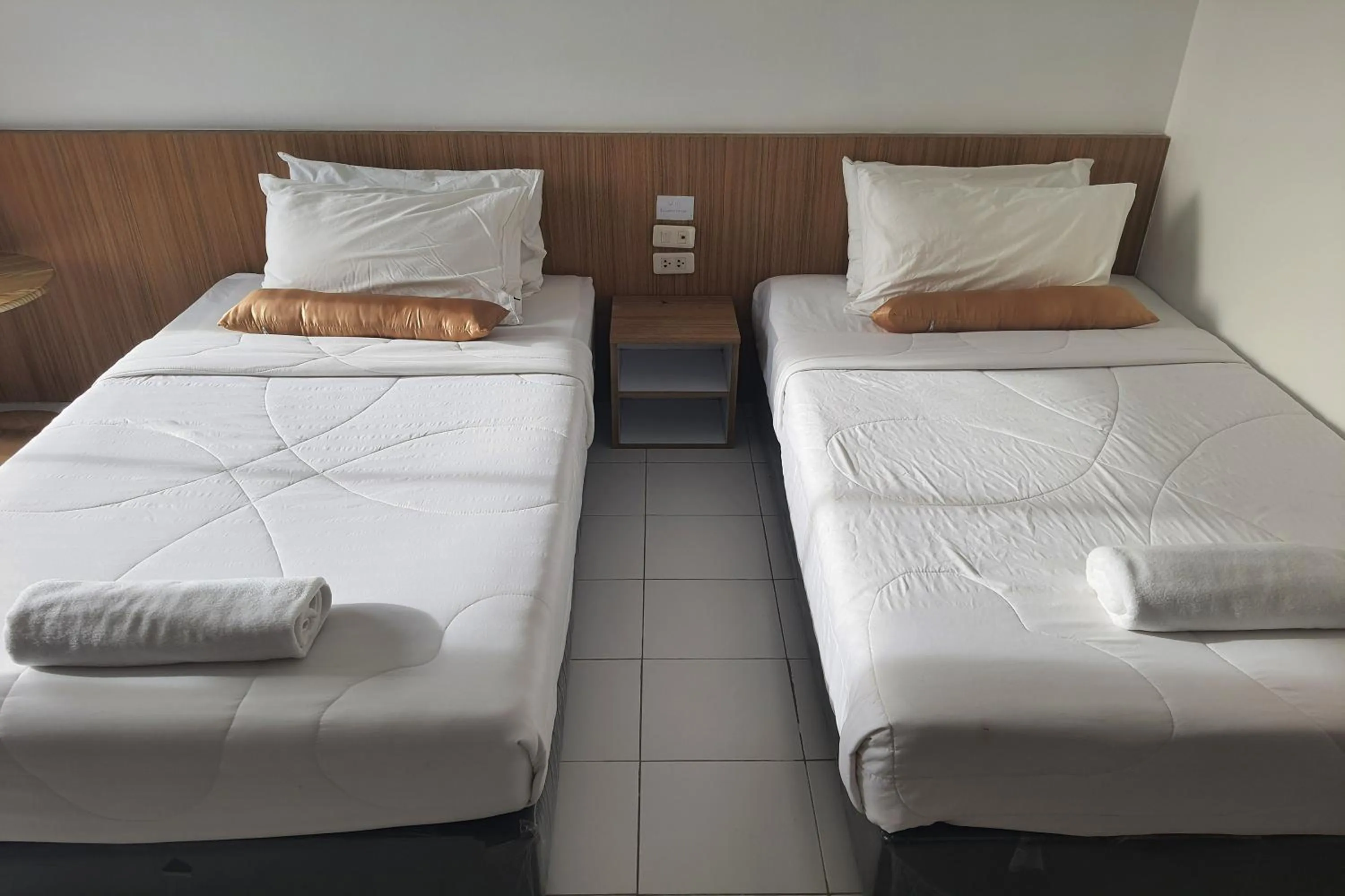 Bed in Patong Bay Inn