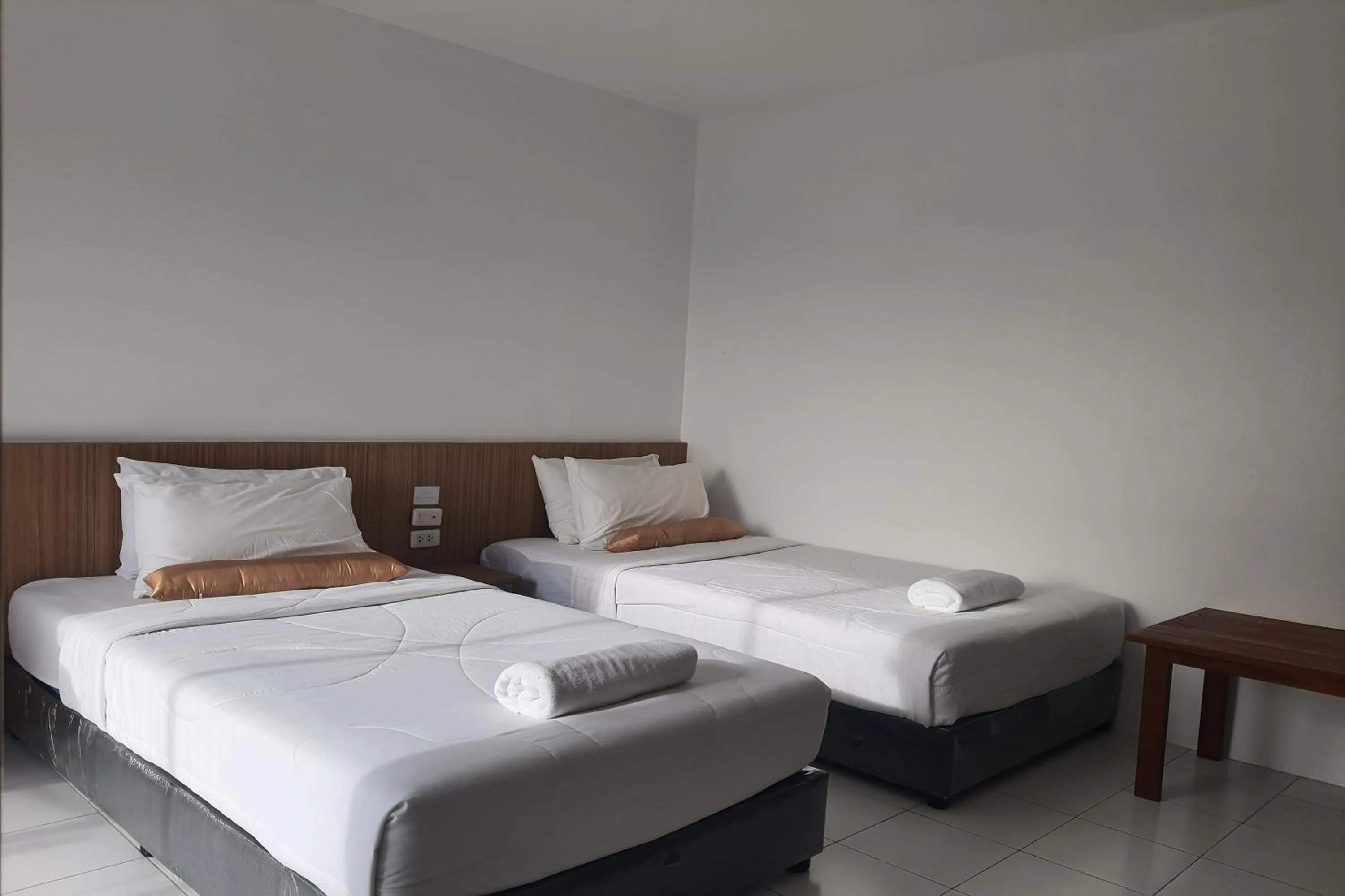 Bed in Patong Bay Inn