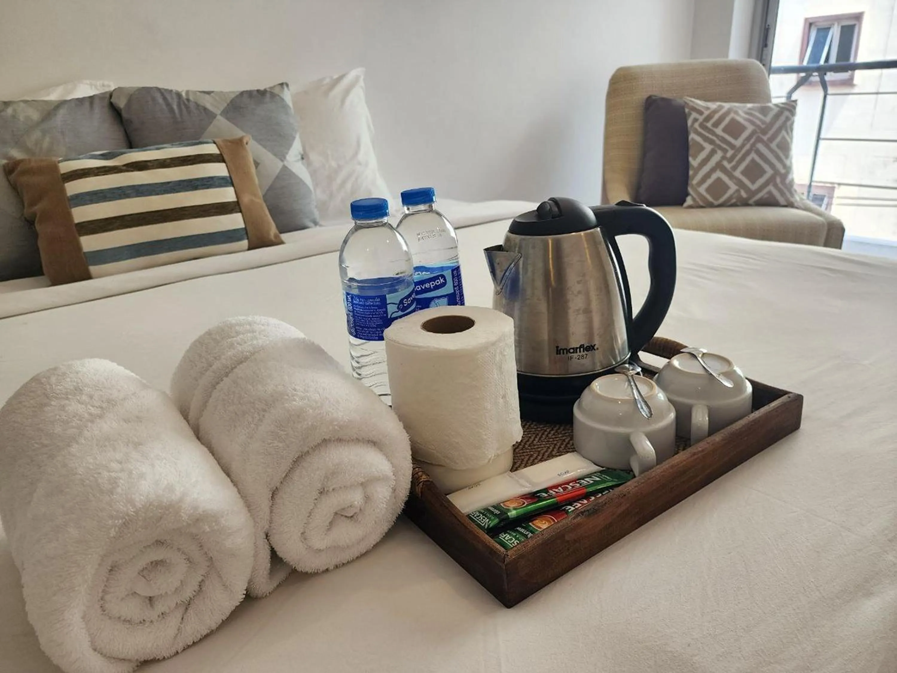 Bed in Patong Bay Inn