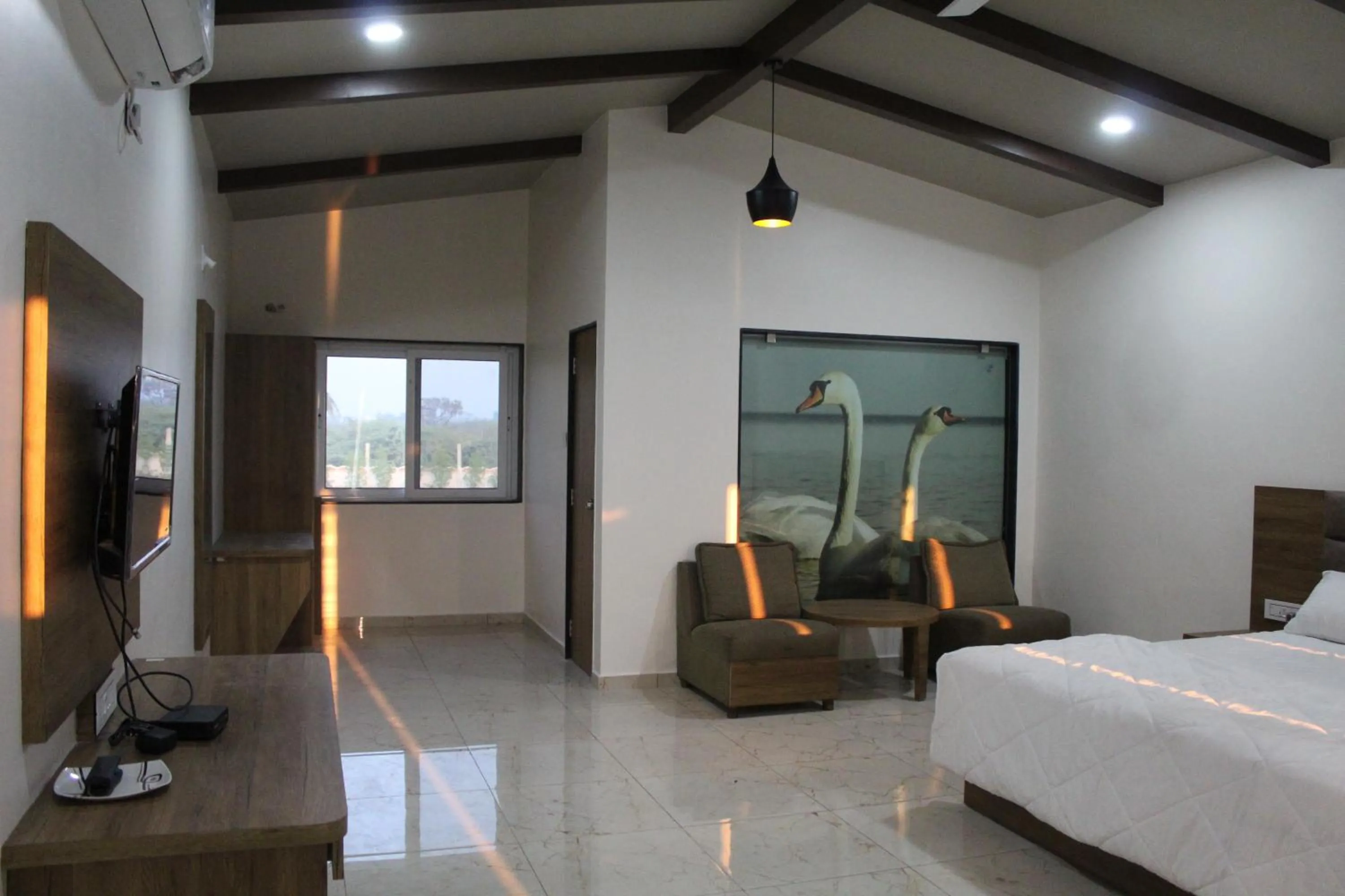 Bedroom, Bed in Flamingo Club and Resort Una 3 Km Away from Diu Check Post