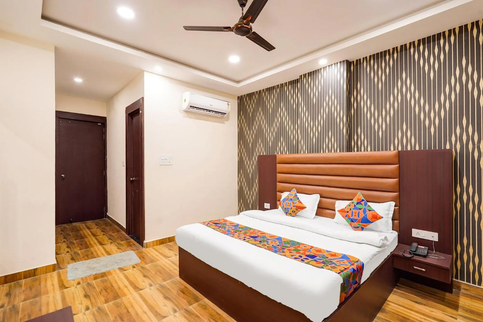 Bed in FabHotel Palm Bliss