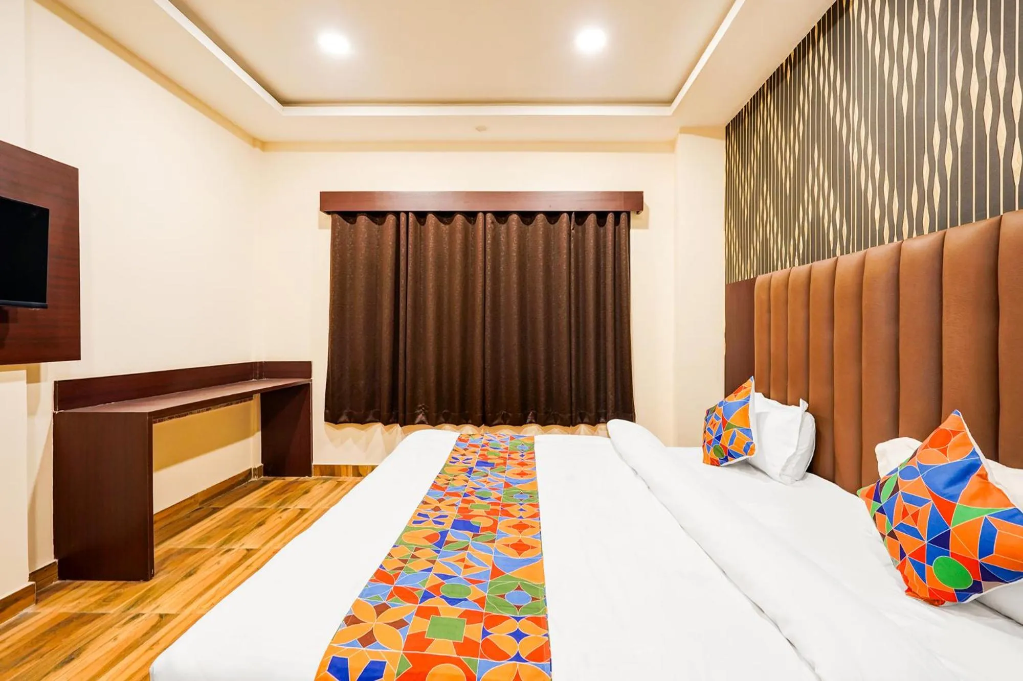 Bed in FabHotel Palm Bliss