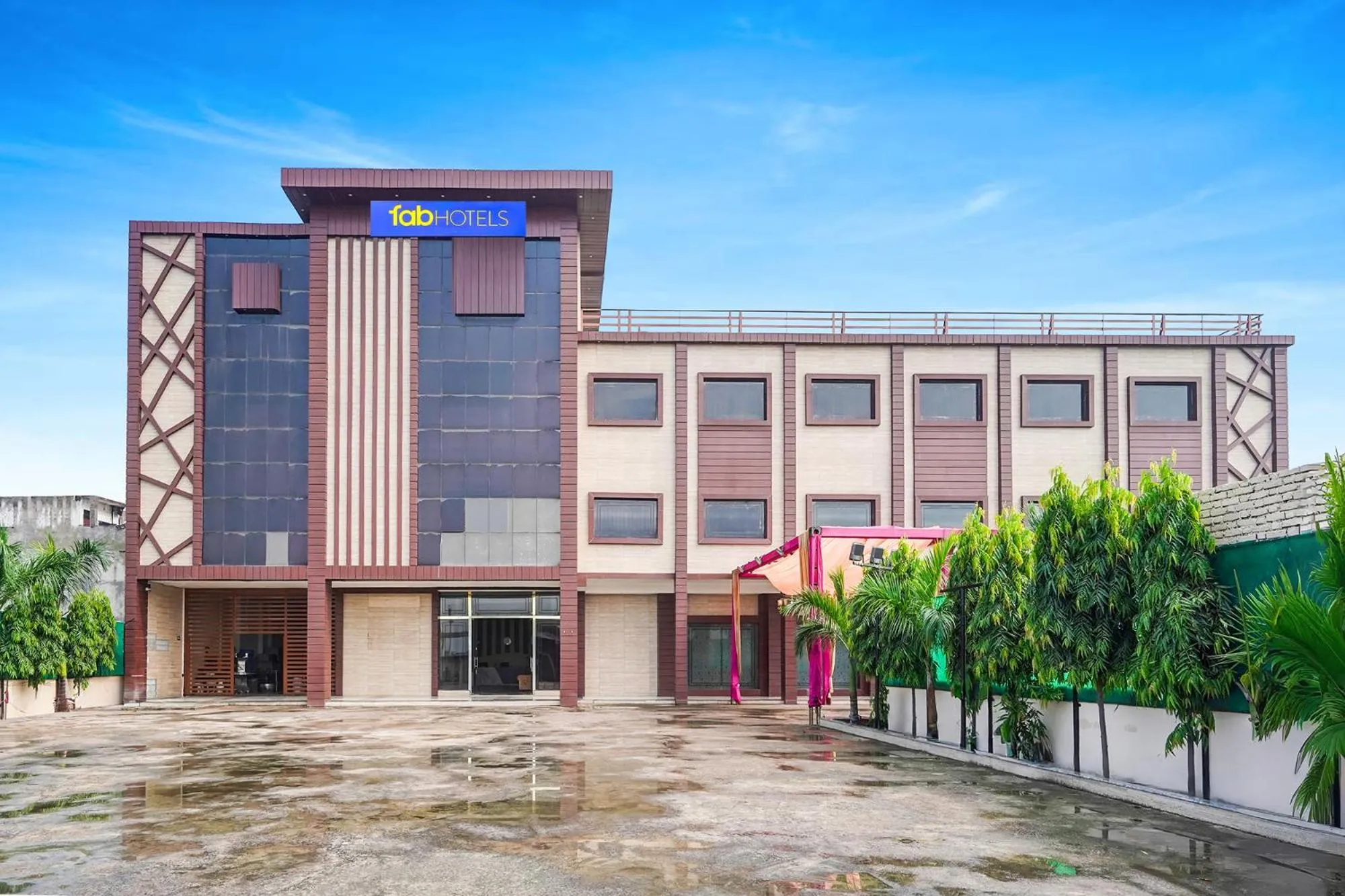 Property building in FabHotel Palm Bliss