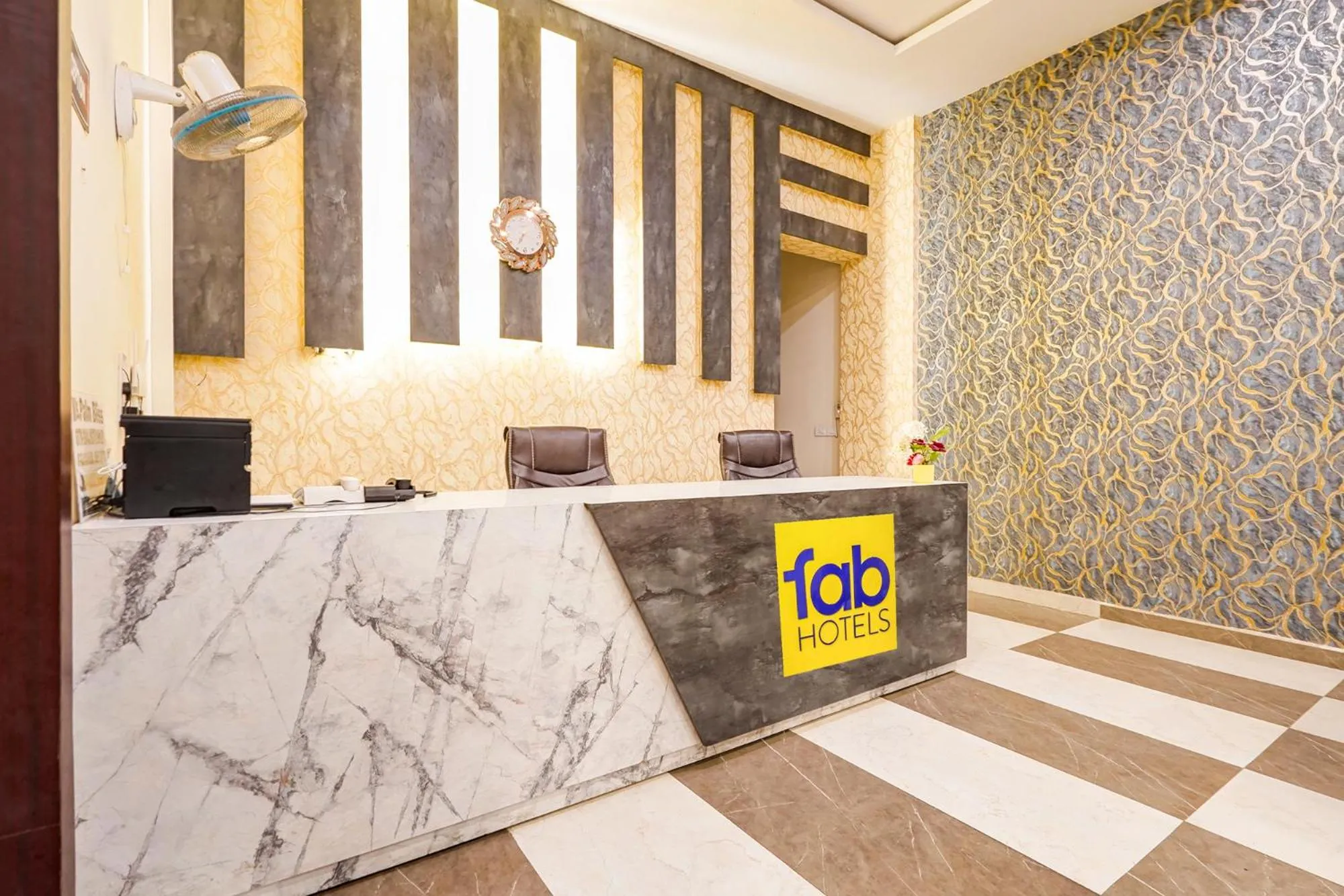 Lobby or reception in FabHotel Palm Bliss