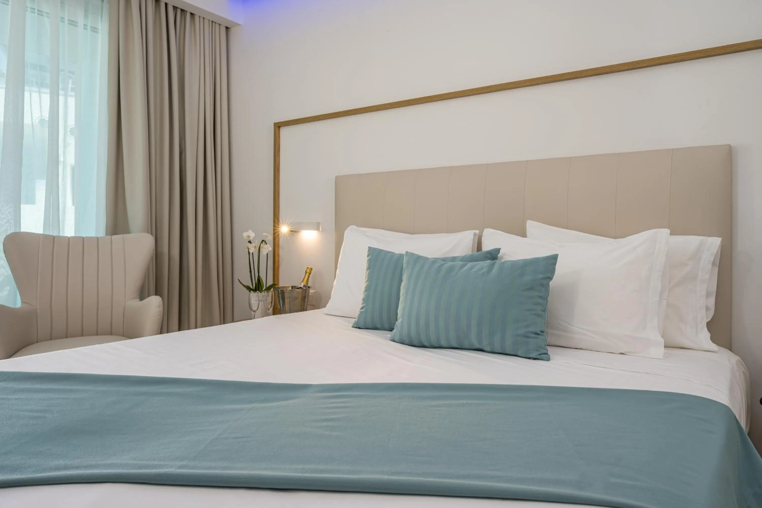 Bed in Mirage Bleu Hotel