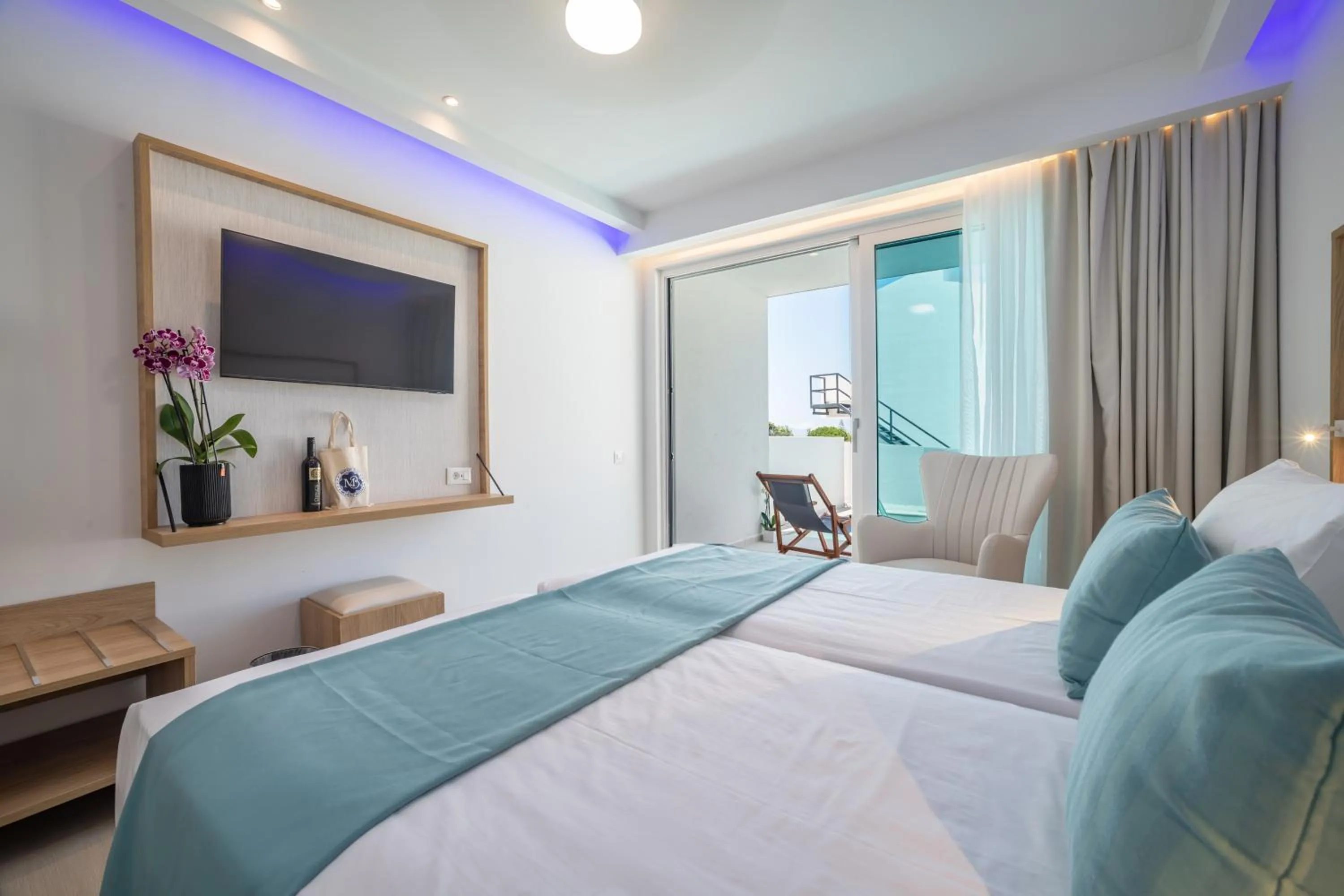 Bed in Mirage Bleu Hotel