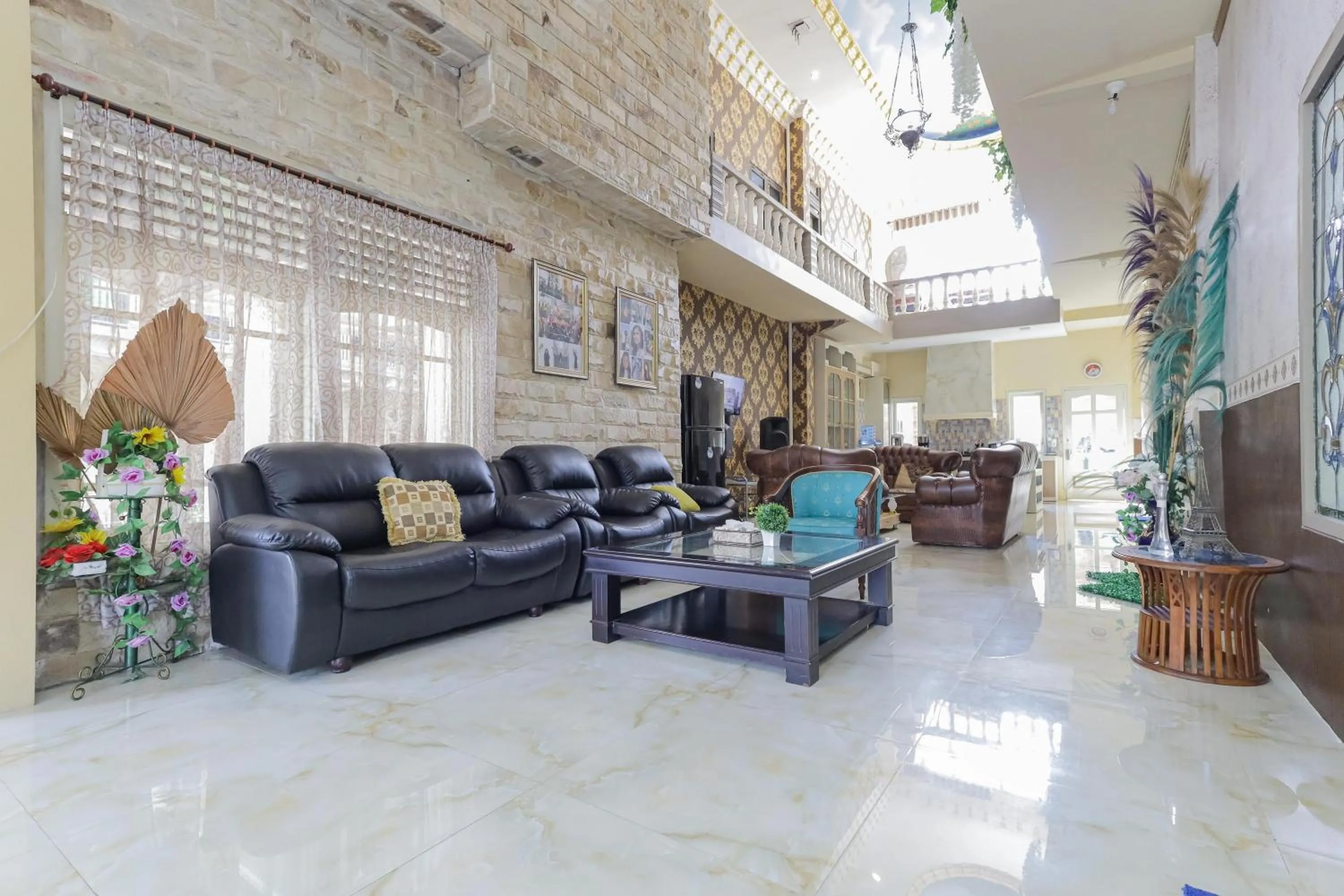 Living room in RedDoorz Plus @ Villa Bontes Batu